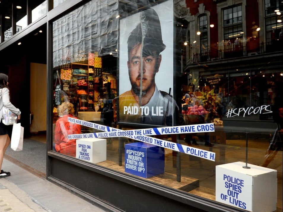 A window display for Cosmetic firm Lush protests the police use of undercover officers to infiltrate political groups