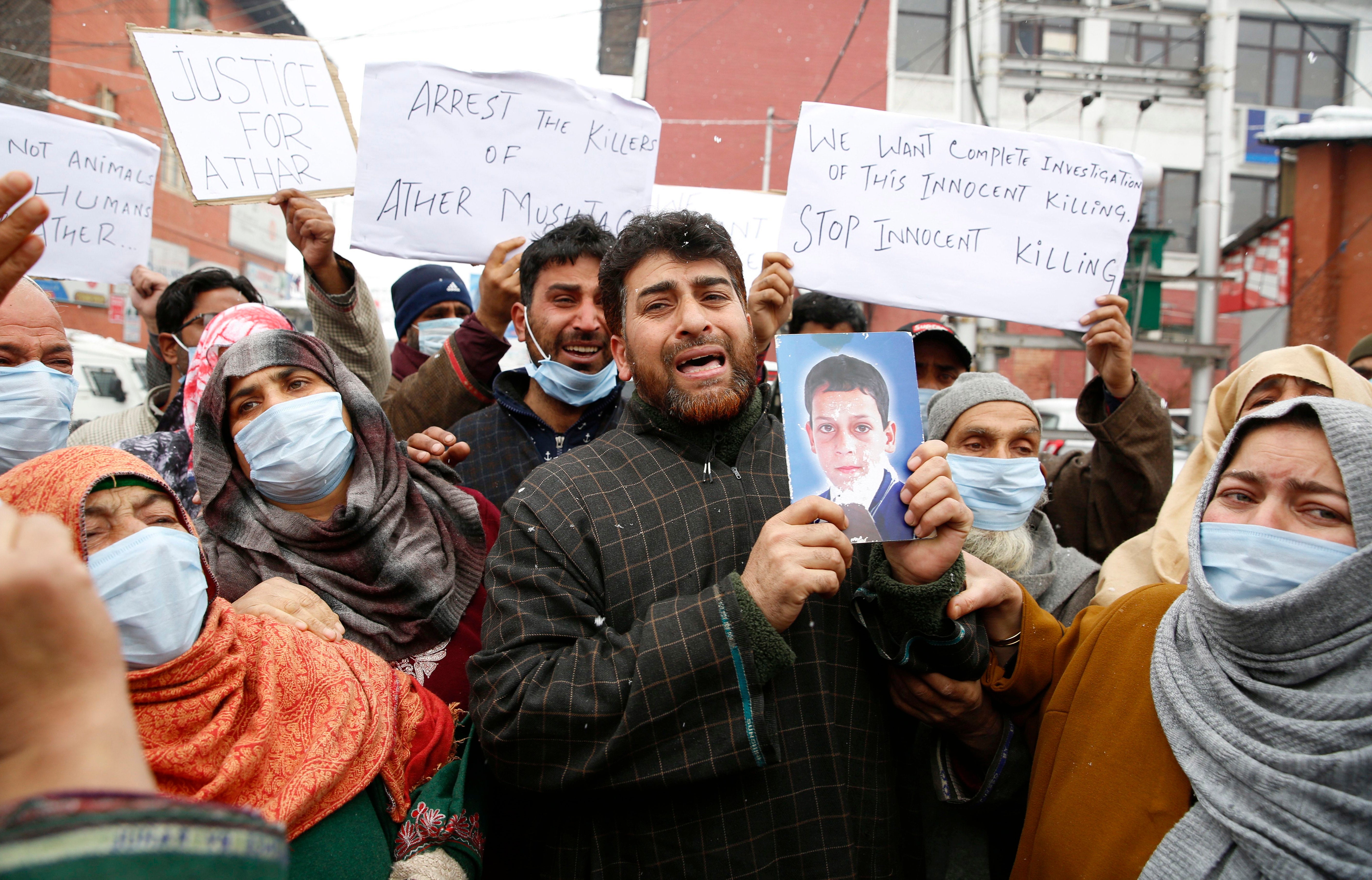 Mushtaq Ahmad Wani, father of Athar Mushtaq, protesting in Srinagar