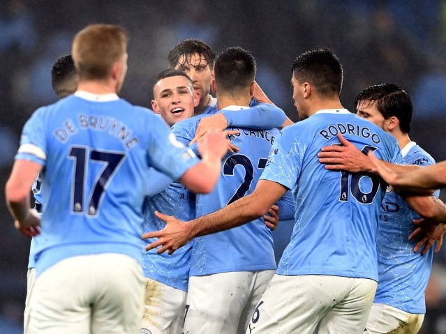 Manchester City celebrate scoring a goal