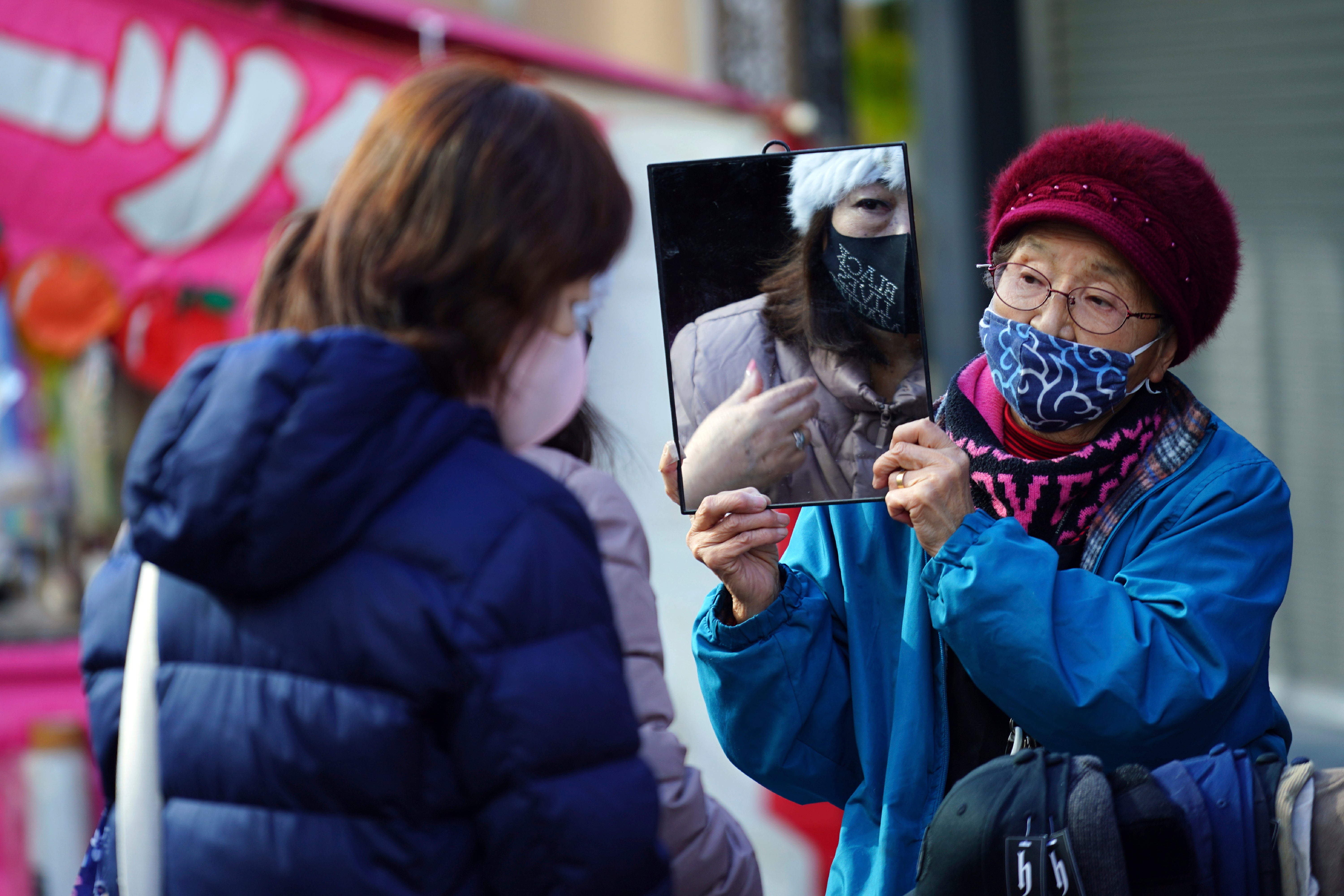 APTOPIX Virus Outbreak Japan Daily Life