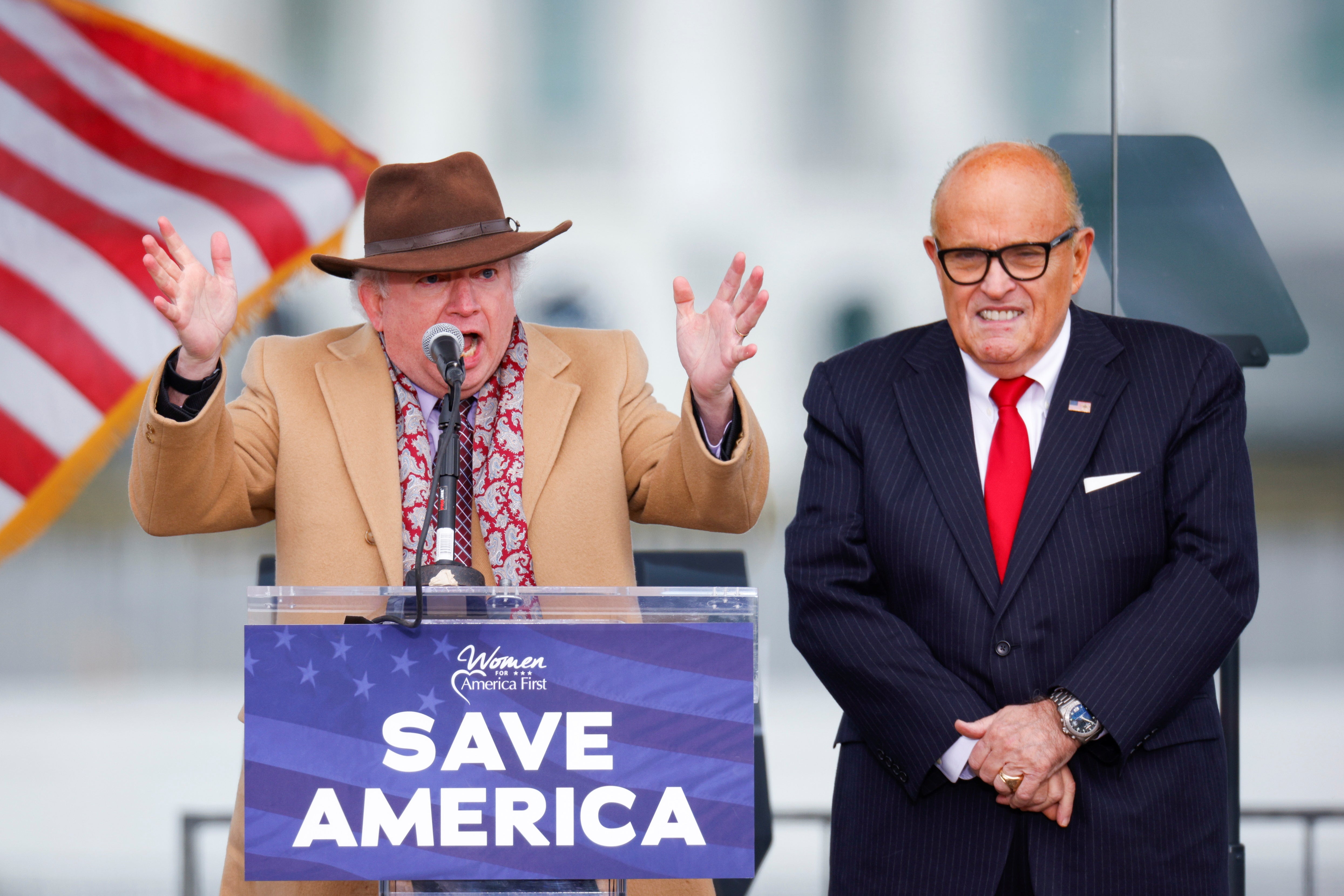 Former Chapman University law professor John Eastman, next to US President Donald Trump’s personal lawyer Rudy Giuliani