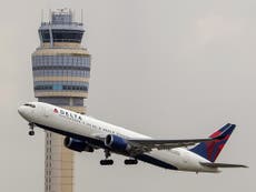 Delta Air Lines passenger tries to open cabin door mid-flight and assaults flight attendant