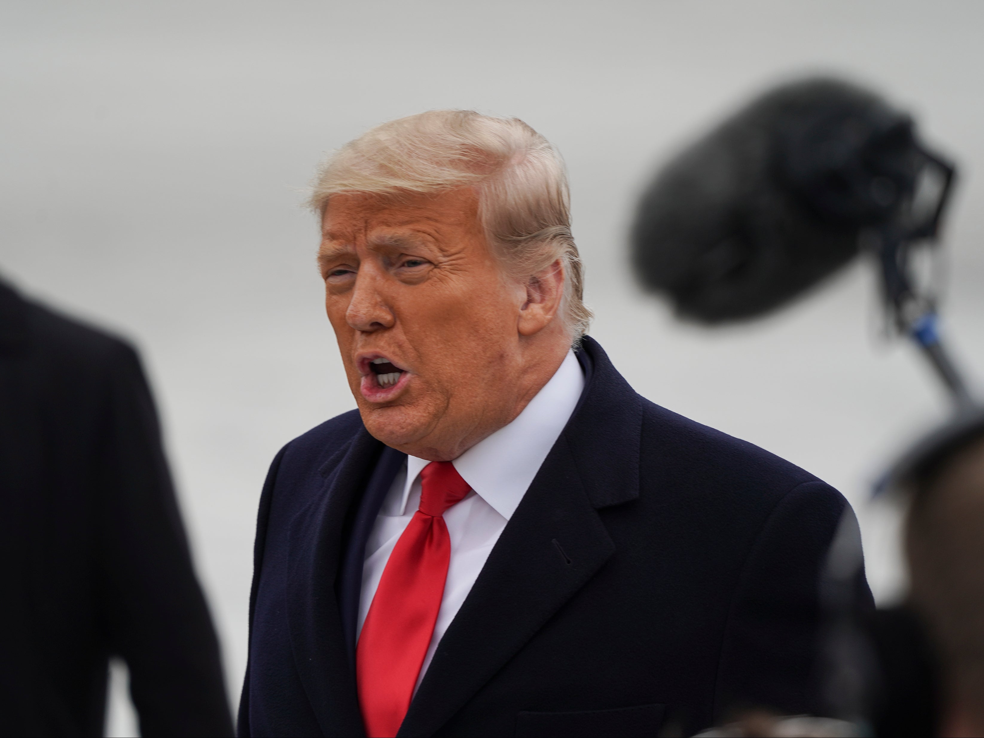 Donald Trump greets supporters at Valley International Airport on 12 January 2021 in Harlingen, Texas