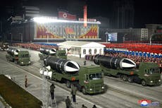 North Korea unveils new submarine-launched missiles in huge military parade