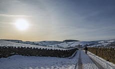 Snow settles across UK as Met Office issues weather warnings