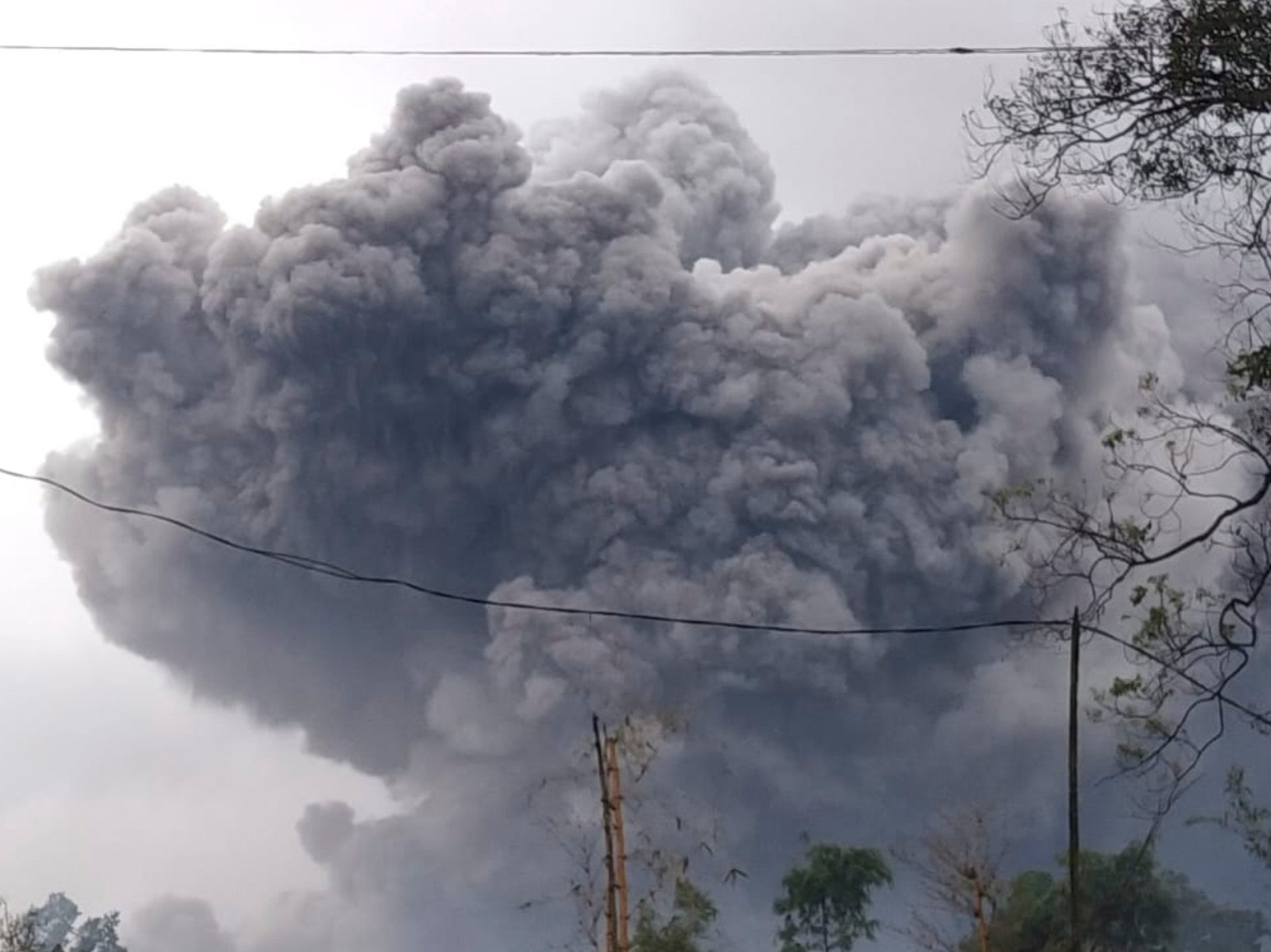 Mount Semeru volcano spews hot ash and smoke into sky on Indonesia’s Java island
