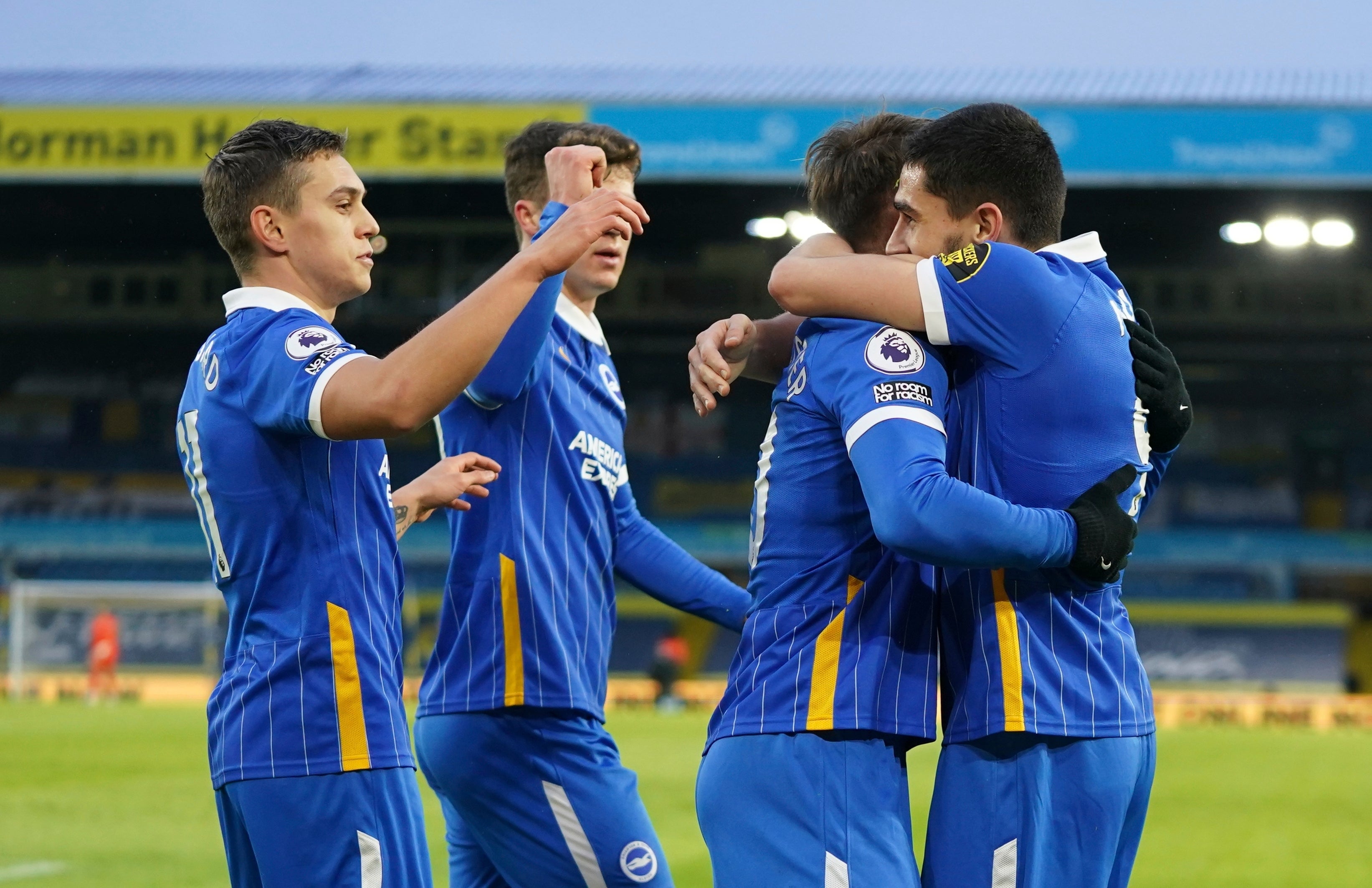 Brighton celebrate their early goal by Neal Maupay