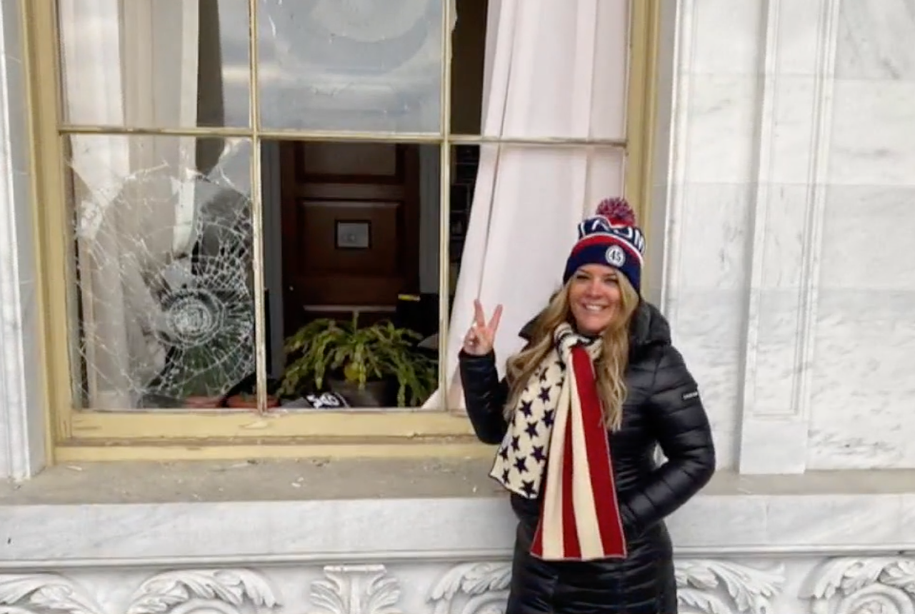 Texas realtor Jenna Ryan, pictured at the Capitol on 6 January 2021, wants a presidential pardon for her participation in the riot