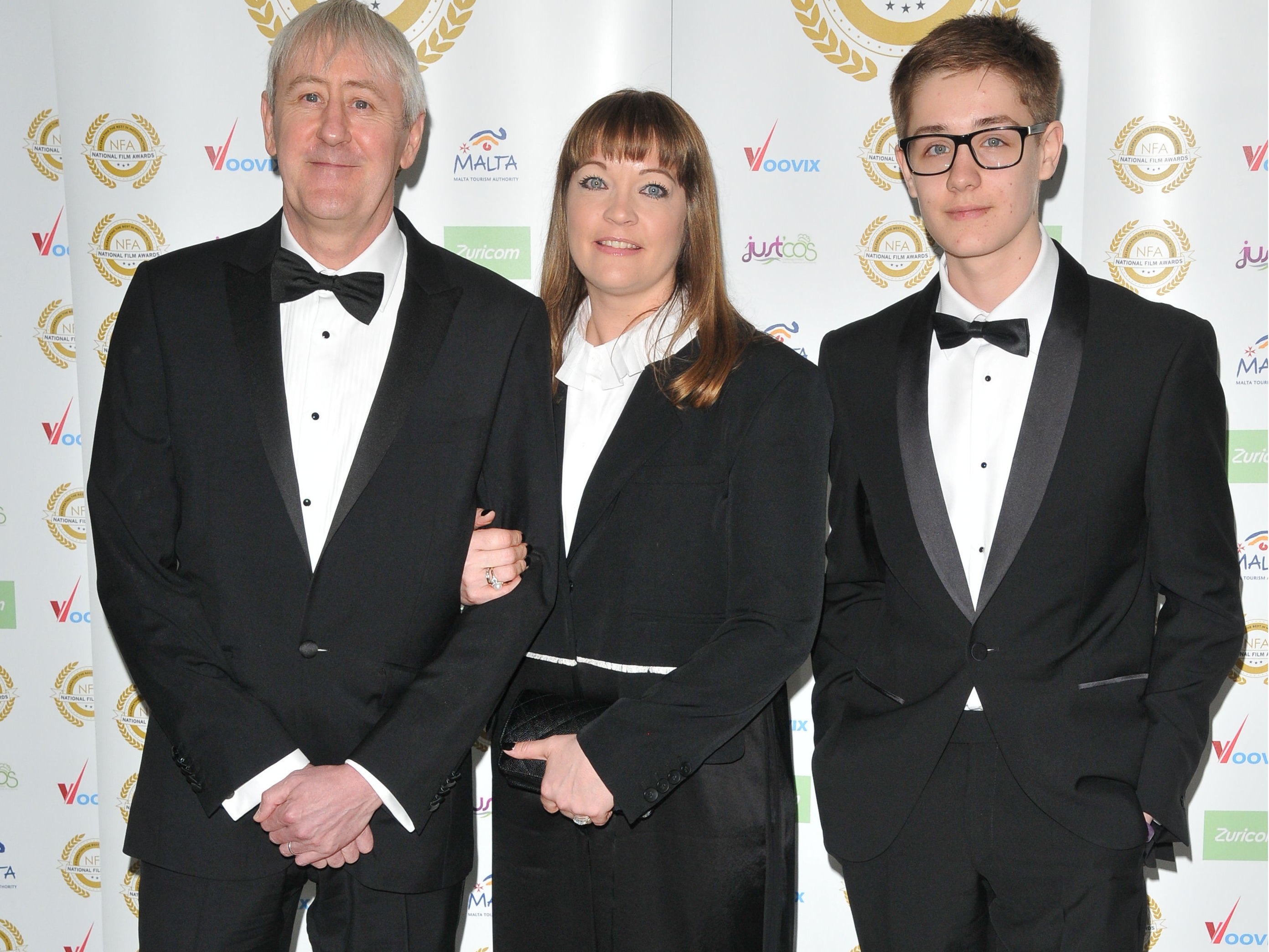 Archie (far right) with his father Nicholas Lyndhurst and mother Lucy Smith in 2017