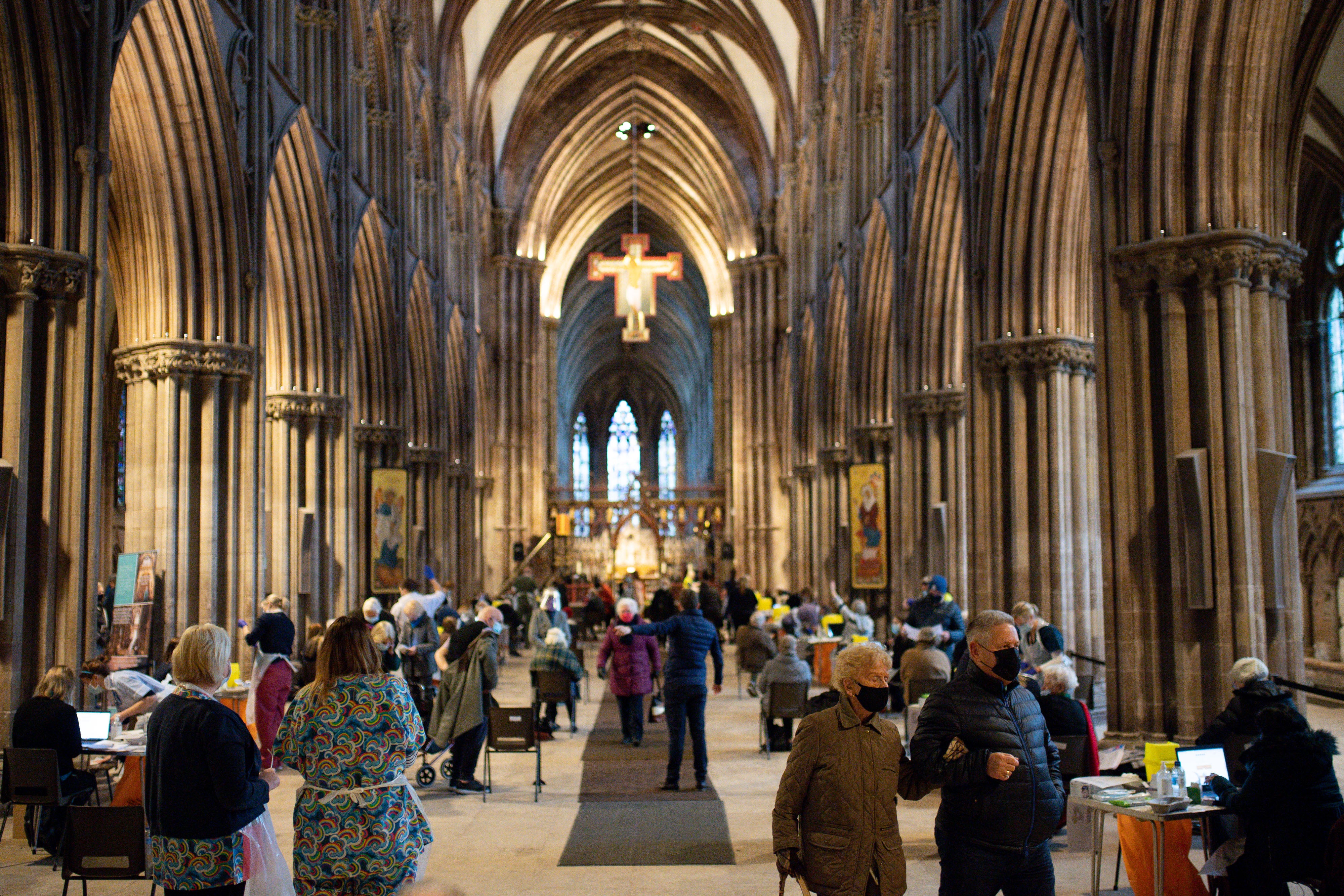 Members of the public at Lichfield Cathedral, Staffordshire, to receive the Oxford/AstraZeneca coronavirus vaccine.