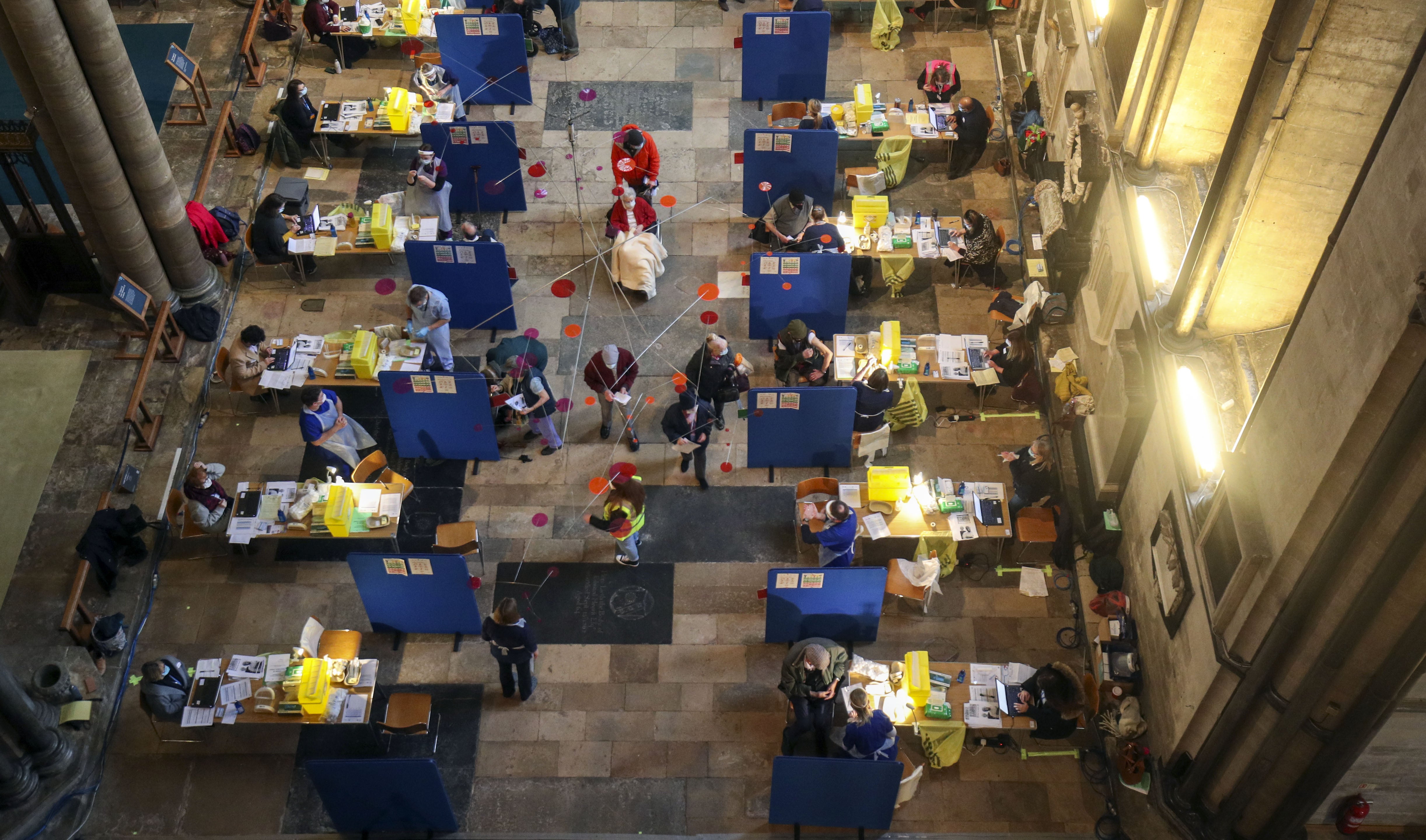 Cubicles erected inside Salisbury Cathedral, Wiltshire, for people to receive an injection of the Pfizer coronavirus vaccine.