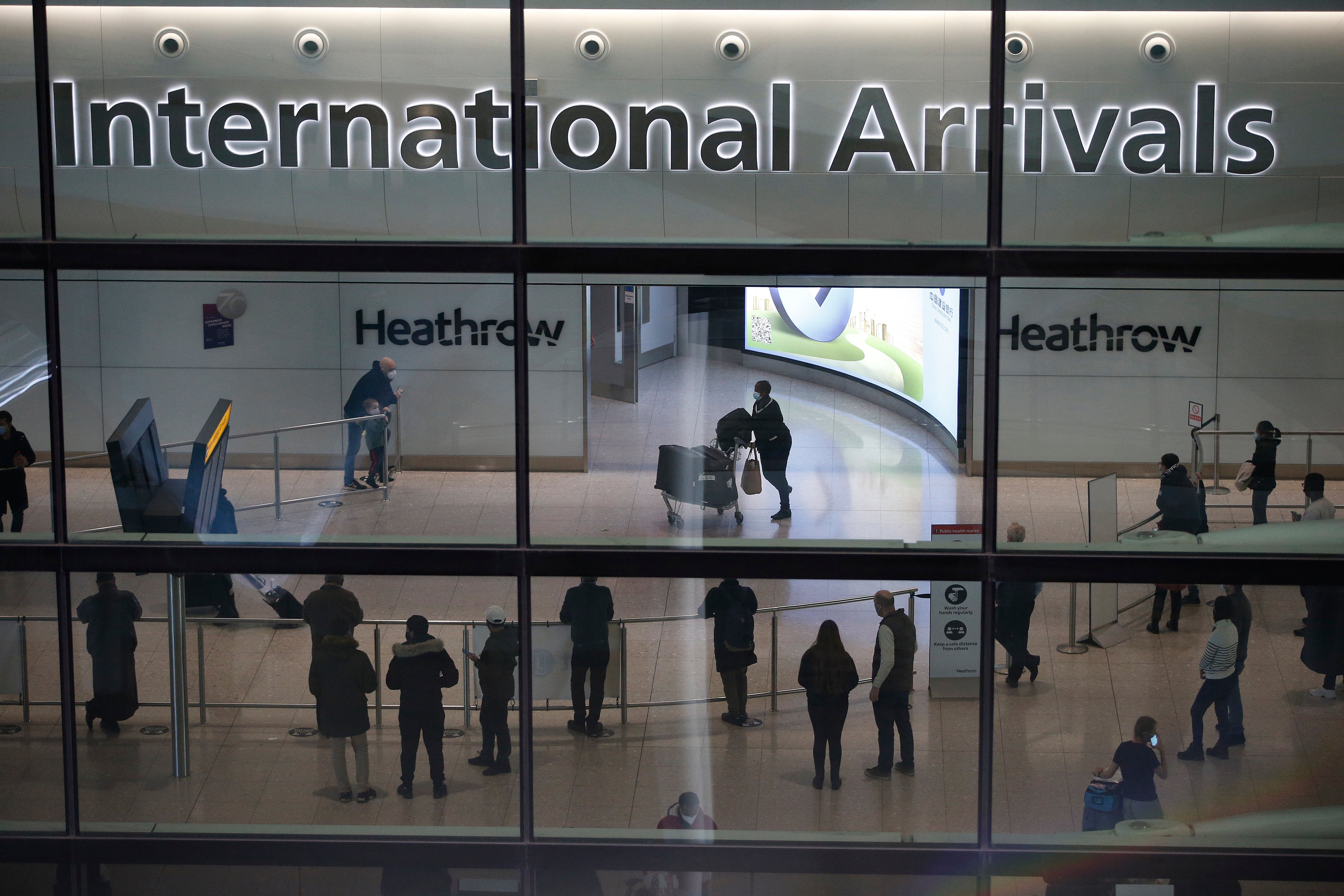 Travellers at Heathrow on Sunday