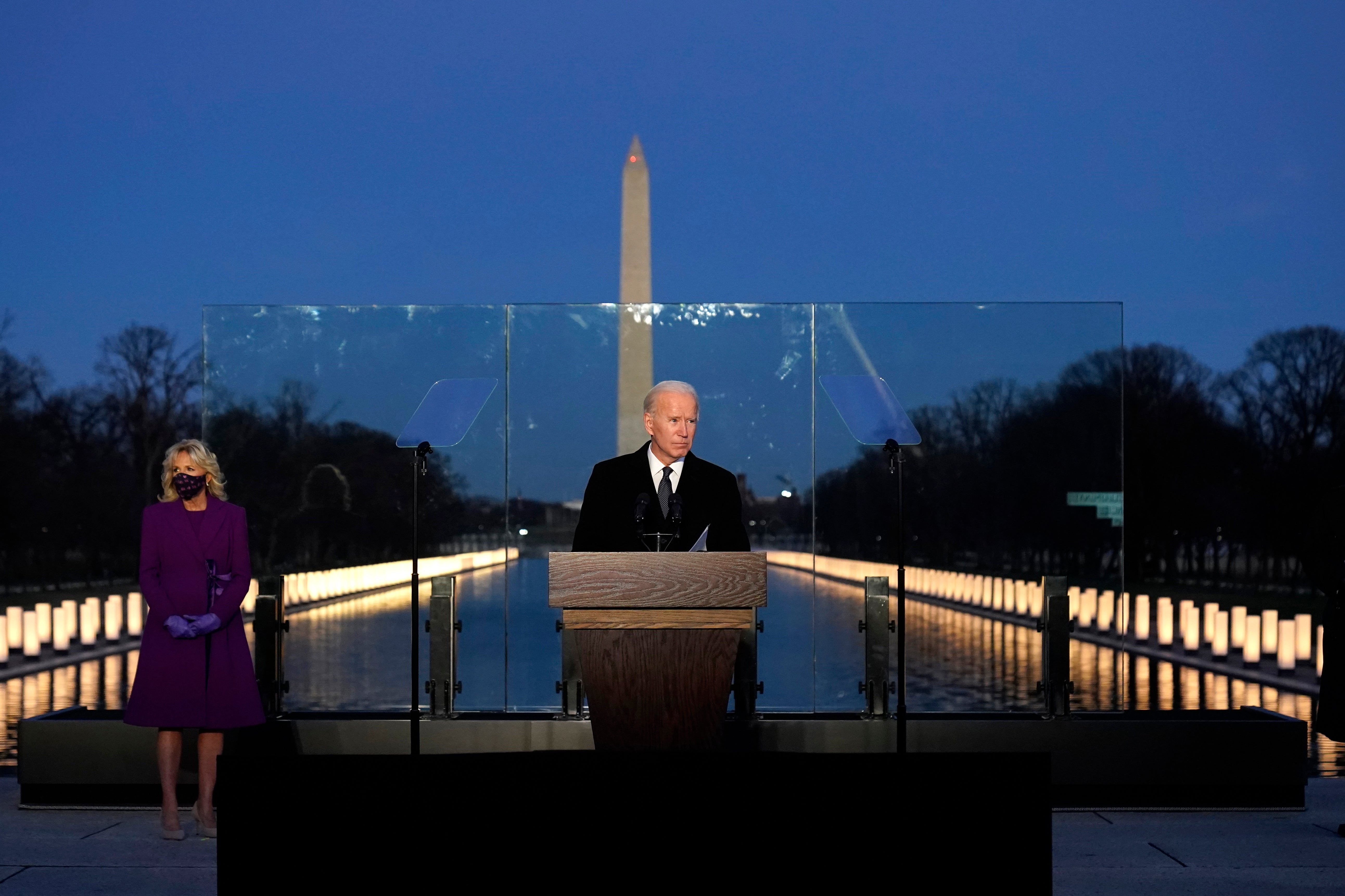 Biden leads Lincoln Memorial Covid vigil as US deaths top 400,000