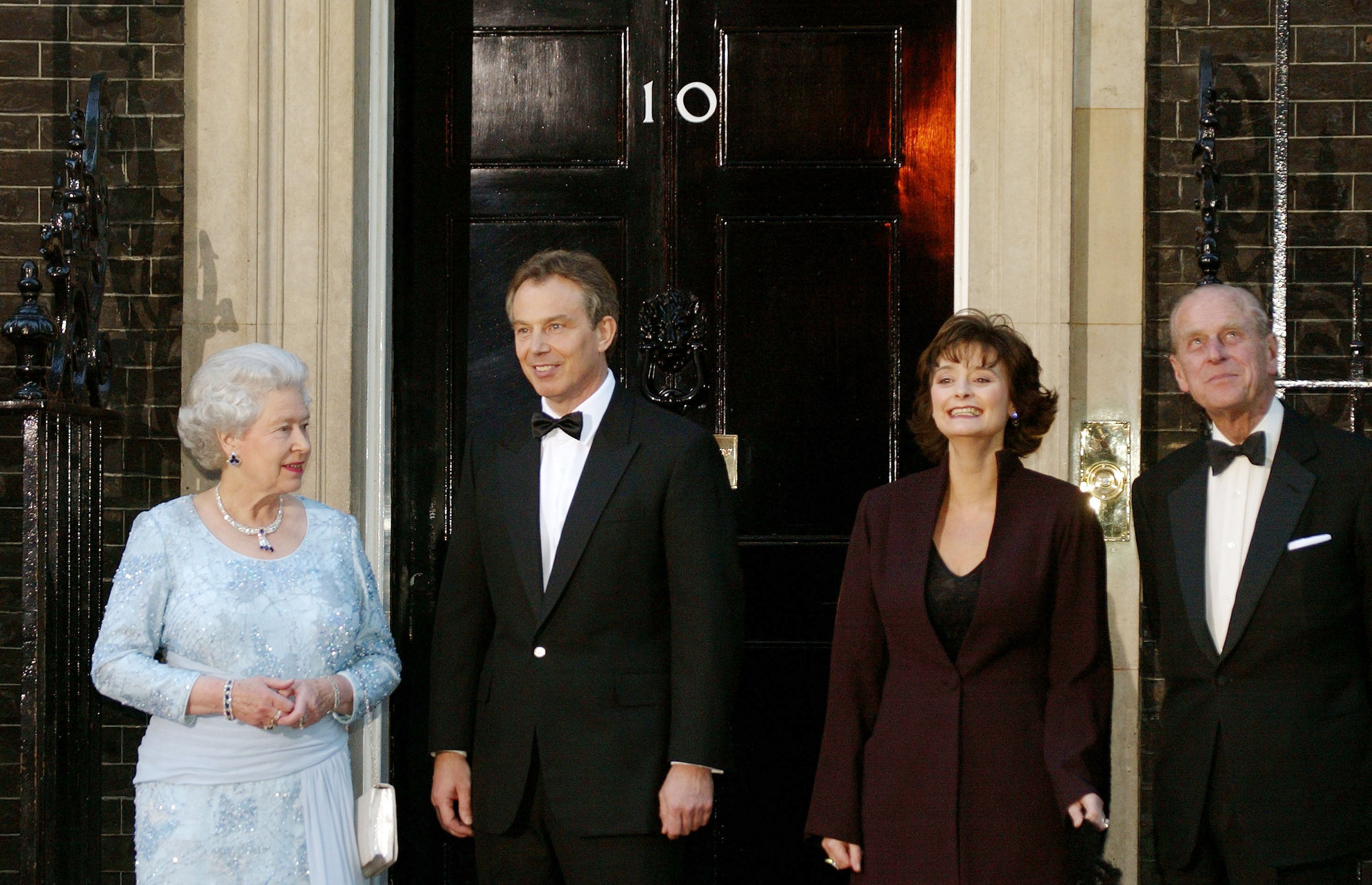 Queen Elizabeth II, British prime minister Tony Blair, Blair’s wife Cherie, and Prince Philip in 2002