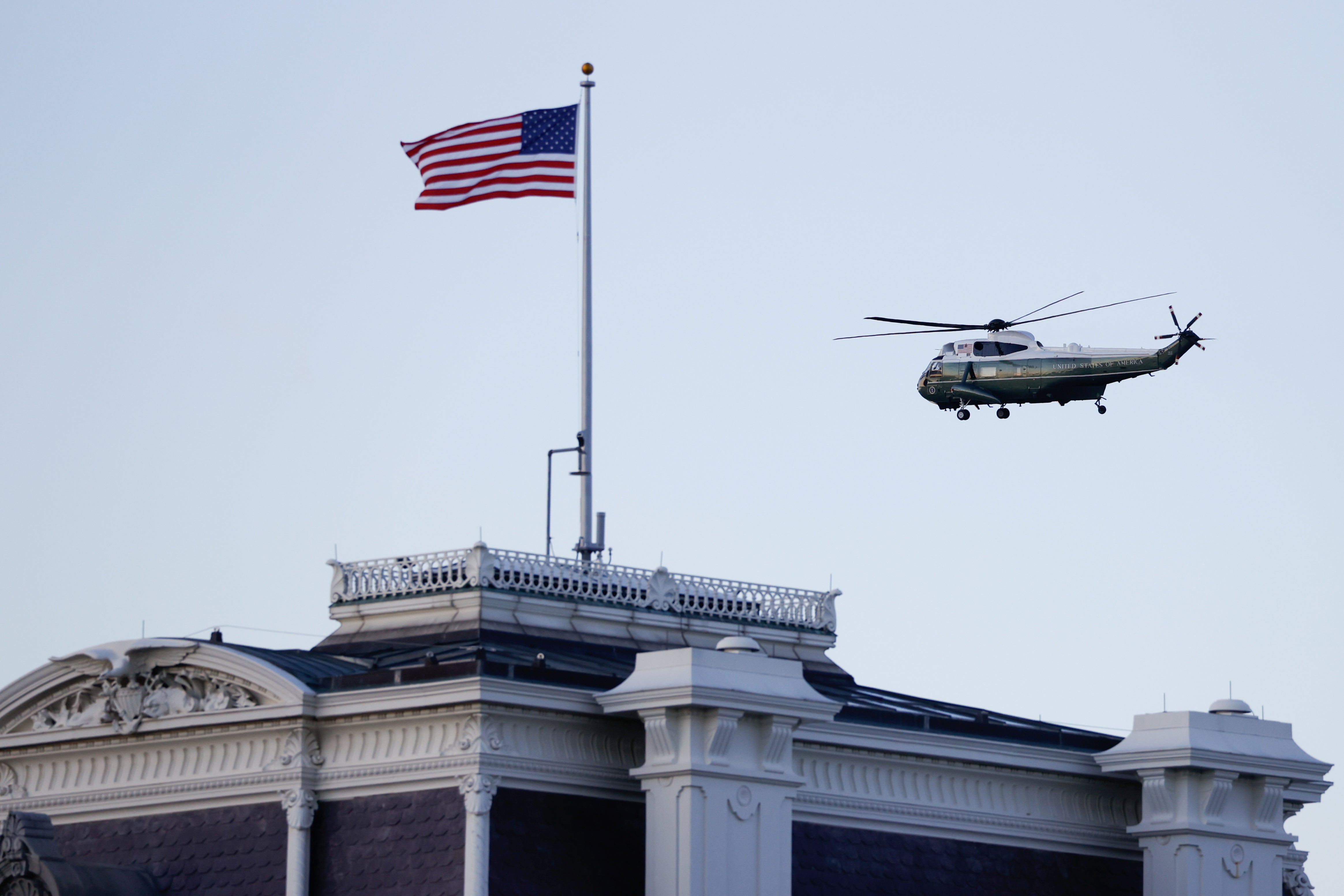 Donald Trump departs the White House aboard Marine One