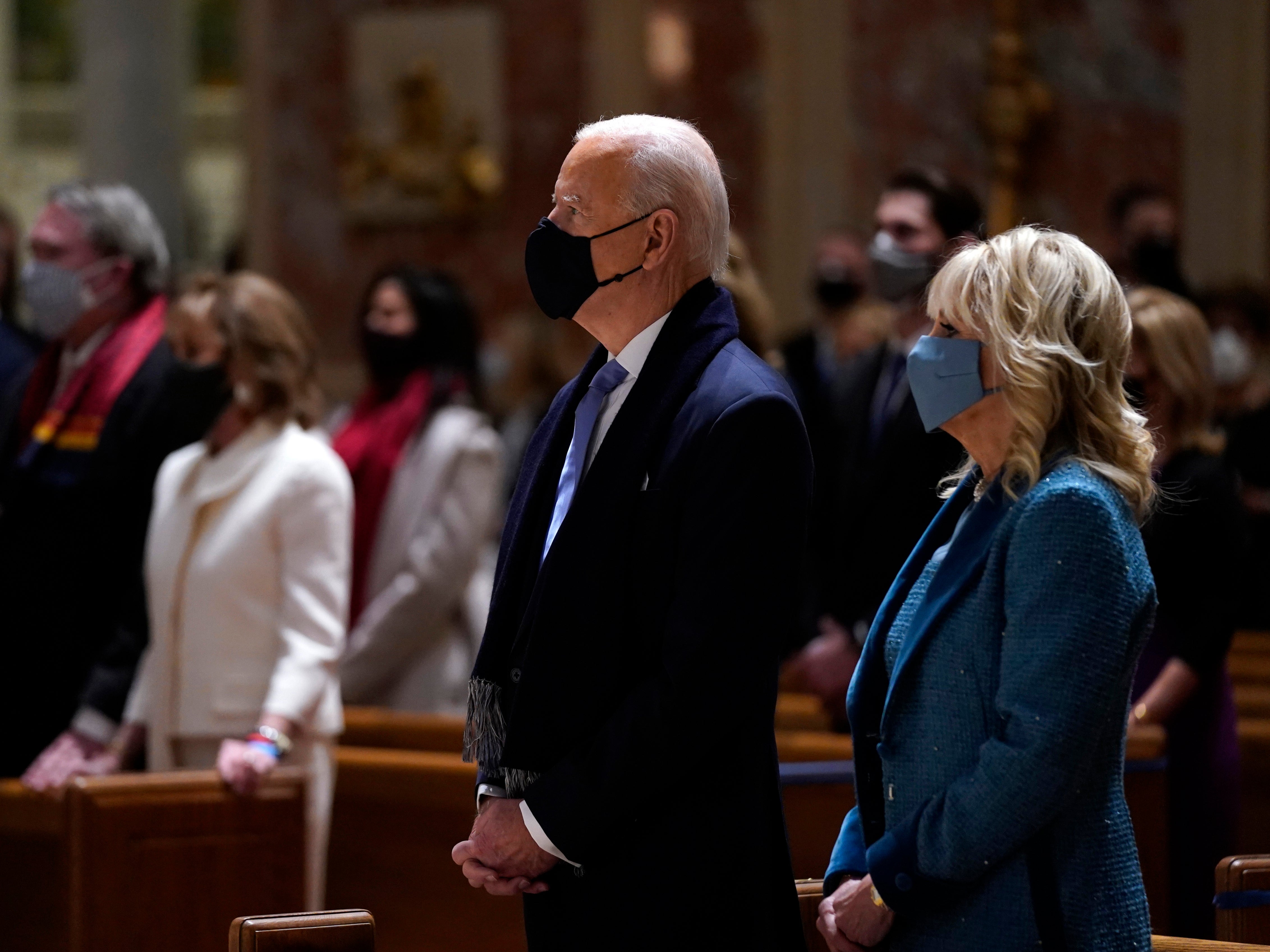 President-elect Joe Biden is joined his wife Jill Biden as they celebrate Mass at the Cathedral of St. Matthew the Apostle