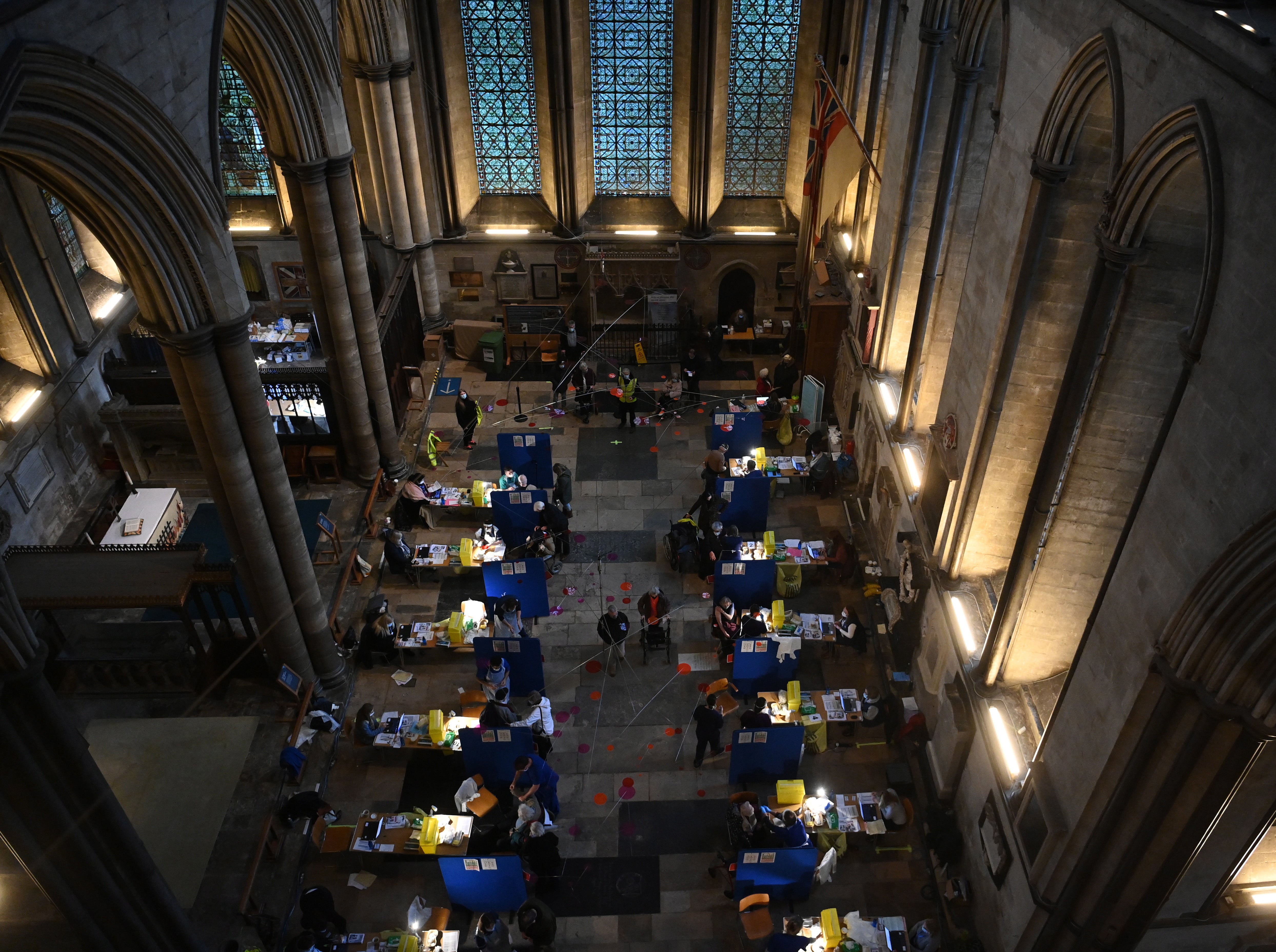 People receive the Pfizer-BioNTech vaccine at a vaccination centre in Salisbury Cathedral on 20 January