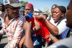 Hundreds in Haiti protest to demand leader's resignation