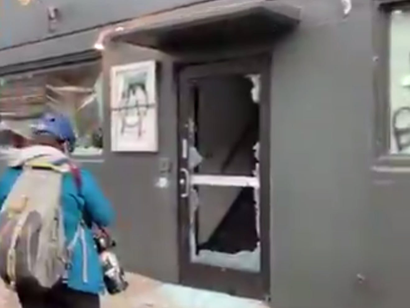 <p>Protesters damage the Democratic Party office building in Portland, Oregon, on Wednesday&nbsp;</p>