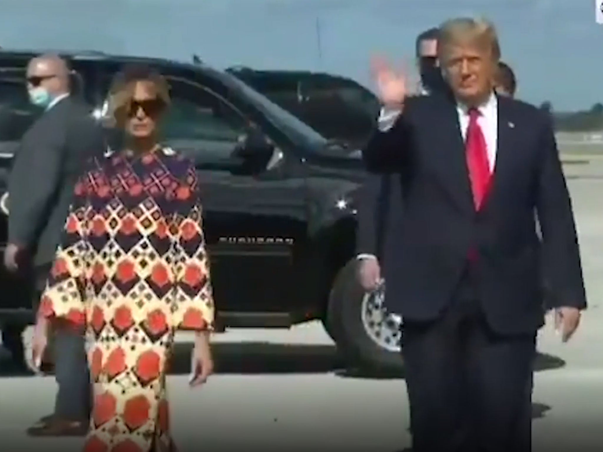 Melania walks away from Donald Trump after landing in Florida