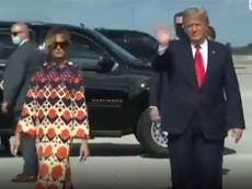 Melania walks away from Donald Trump after landing in Florida