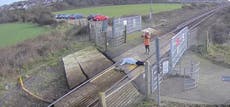 Woman filmed lying across railway tracks in ‘unthinkably stupid stunt’