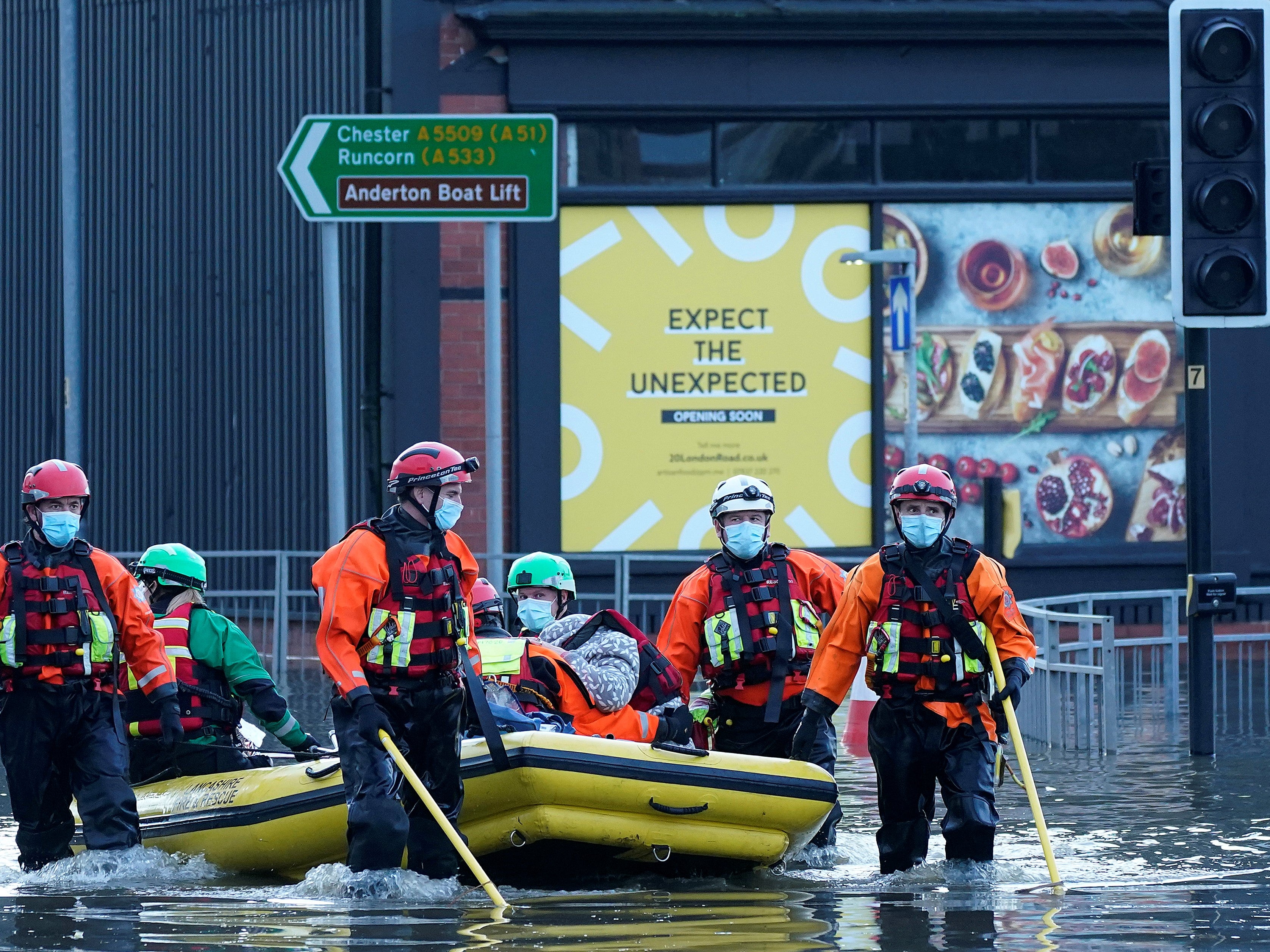 Elderly residents are evacuated from a care home by emergency services in Northwich