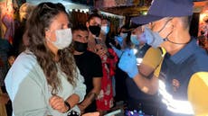 Britons among 89 people arrested for breaking Covid rules at bar party in Thailand, police say