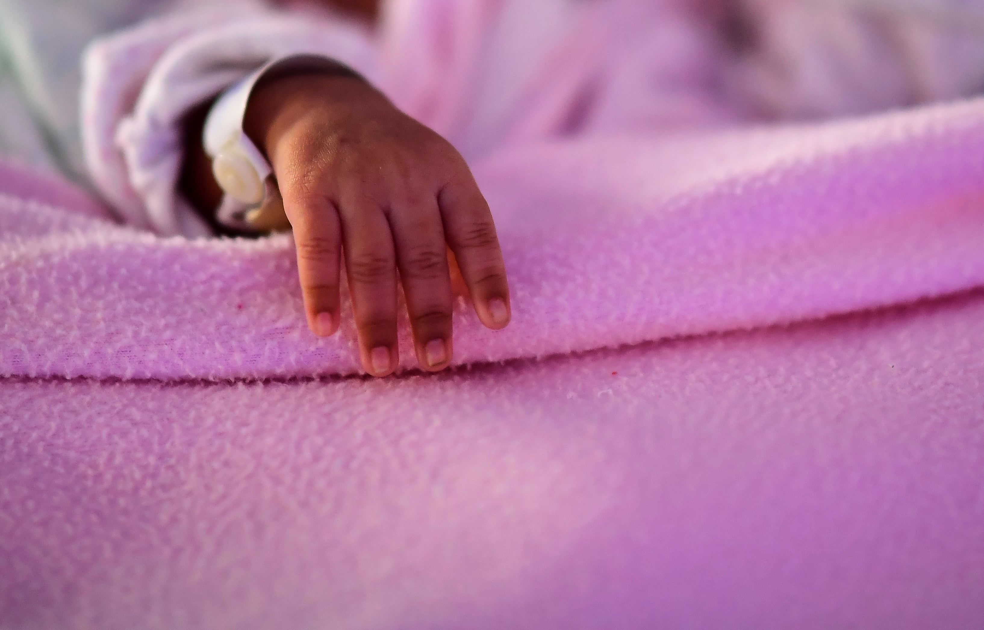 A newborn quadruplet recovers at the Ramon Sarda Maternity Hospital in Buenos Aires, on 7 July, 2020. The lives of millions of children have been protected thanks to major vaccines, a new study has found.