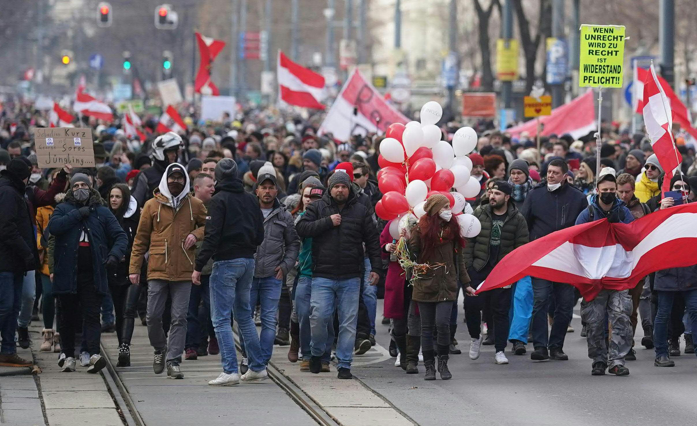 People protest against the ongoing restrictions in Vienna