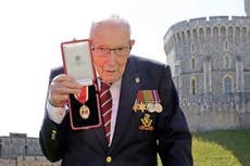 Captain Tom hospitalized after testing positive for COVID-19