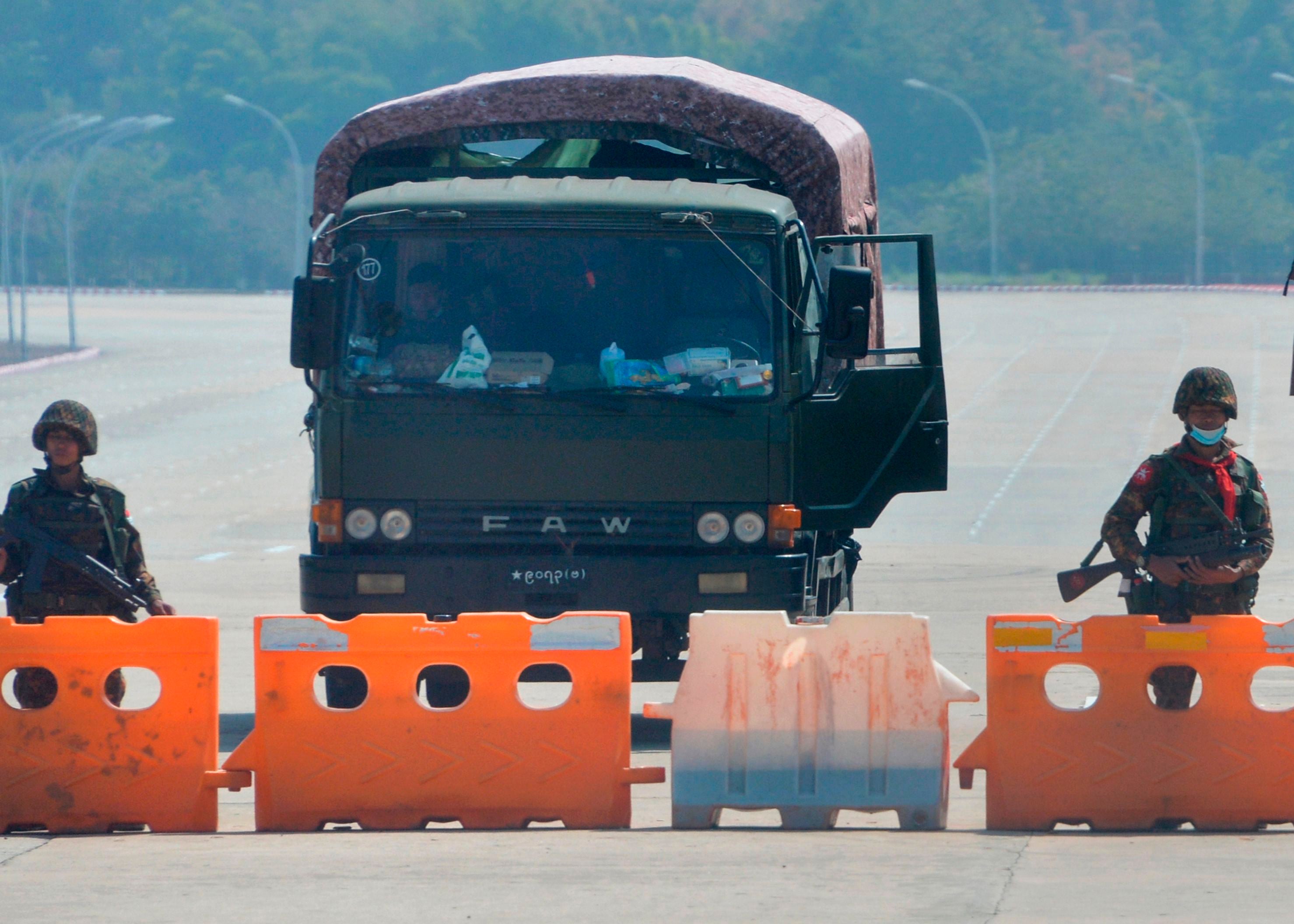 Tanks on Myanmar streets as Aung San Suu Kyi detained - follow live