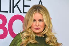Jennifer Coolidge posed as a twin so she could date two men at once