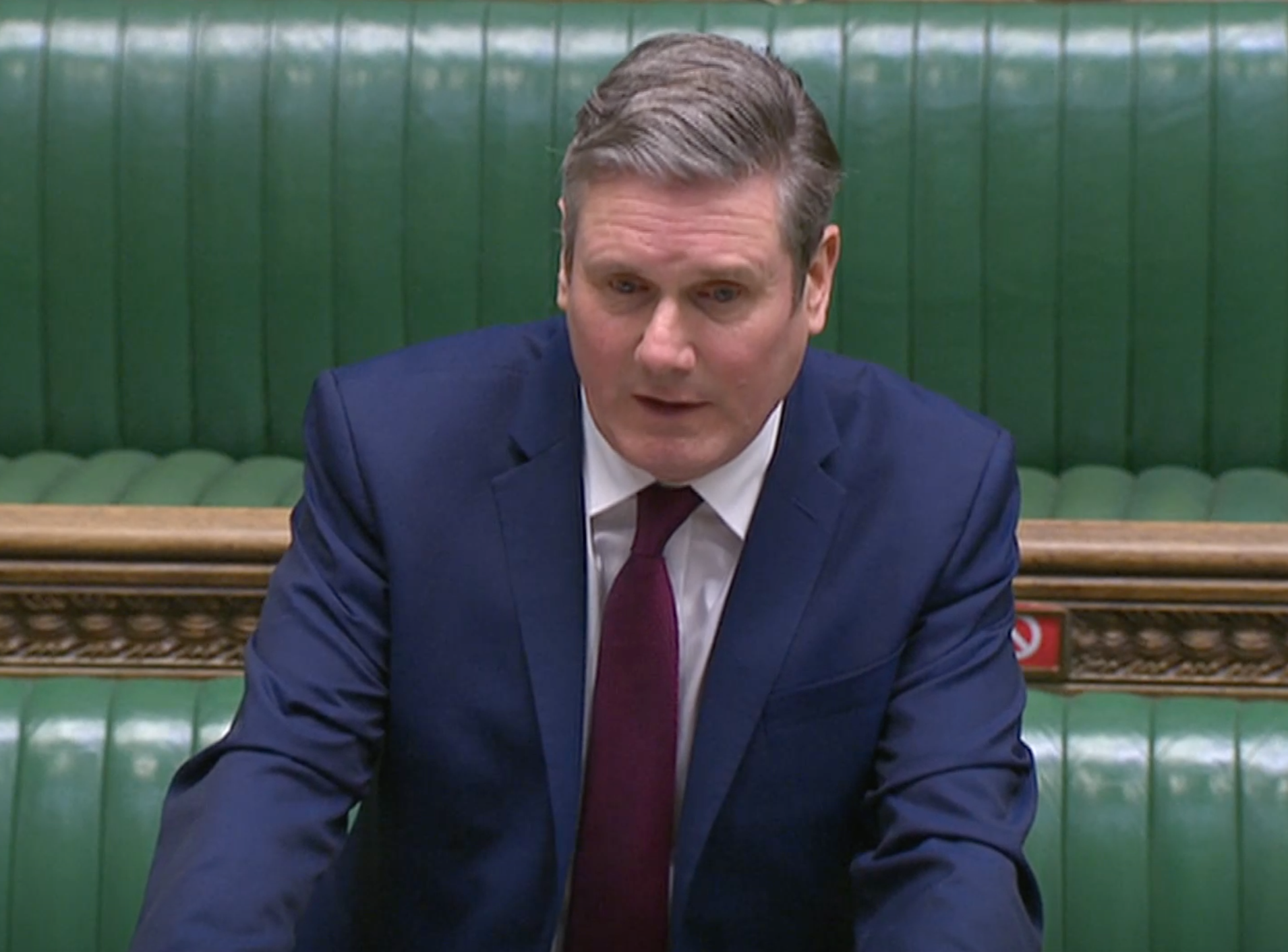 Keir Starmer, slightly smiling, during PMQs