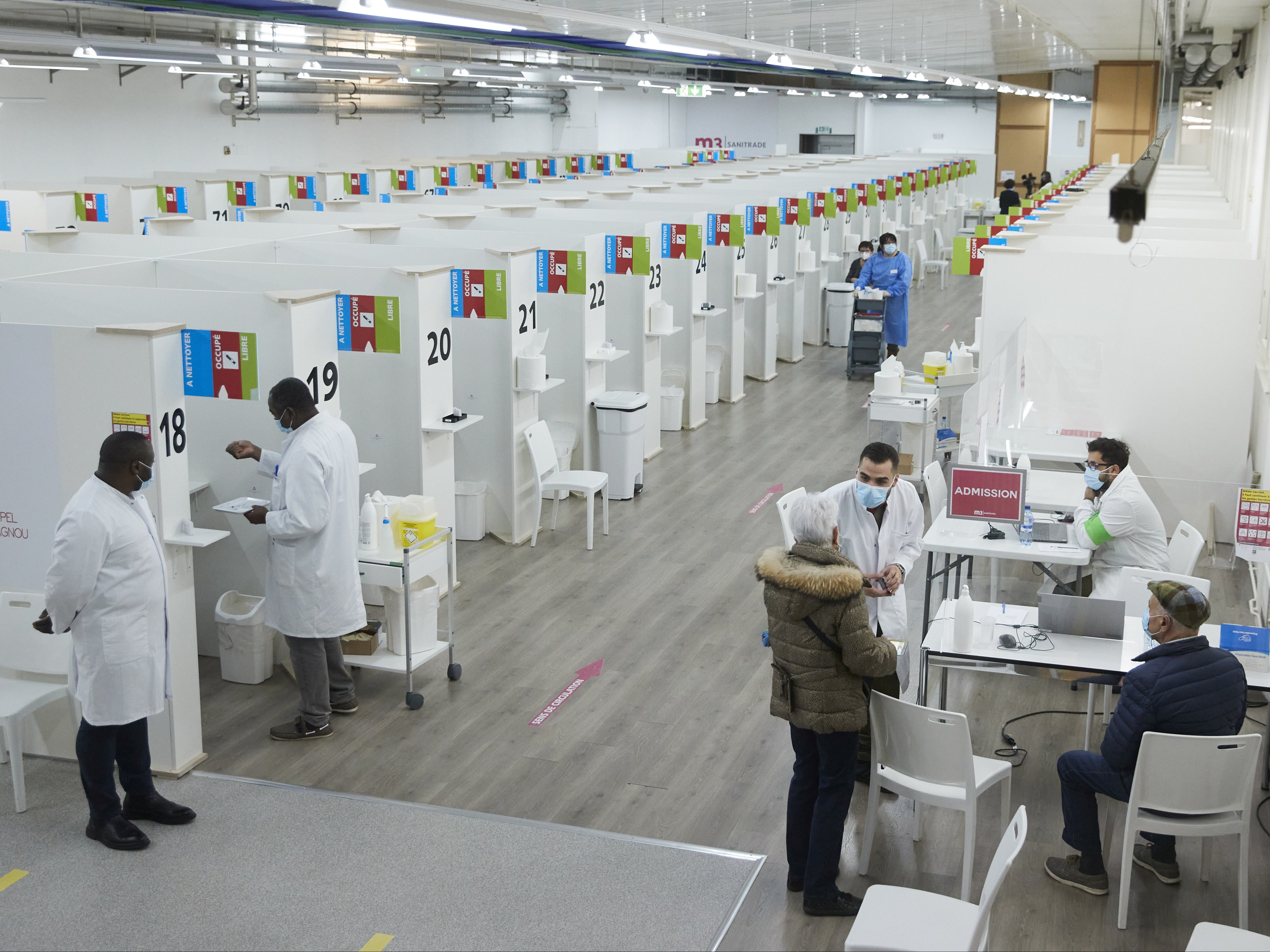 Staff work in a vaccination centre as part of the COVID-19 vaccination campaign in Geneva, Switzerland