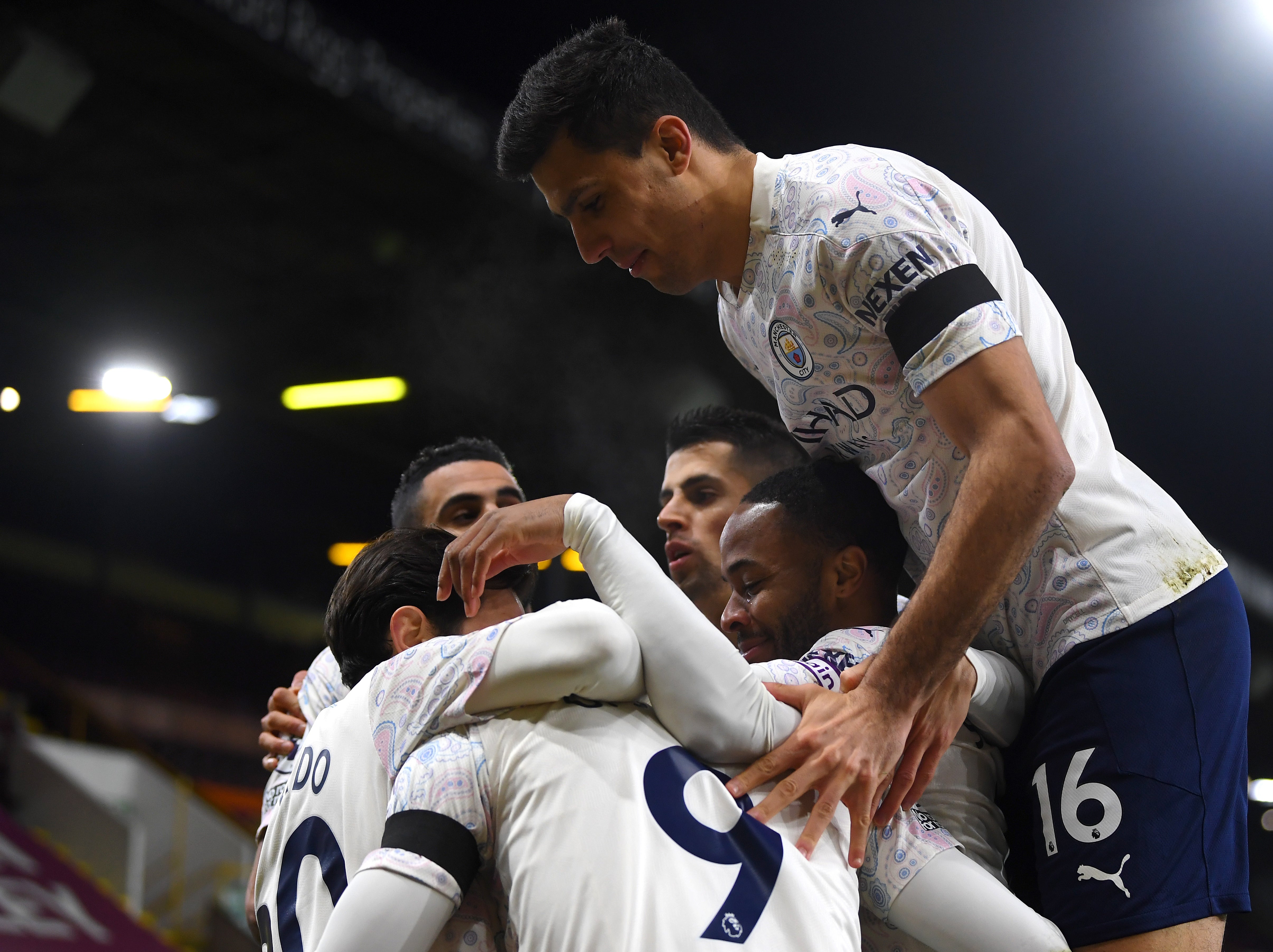 Manchester City celebrate at Turf Moor