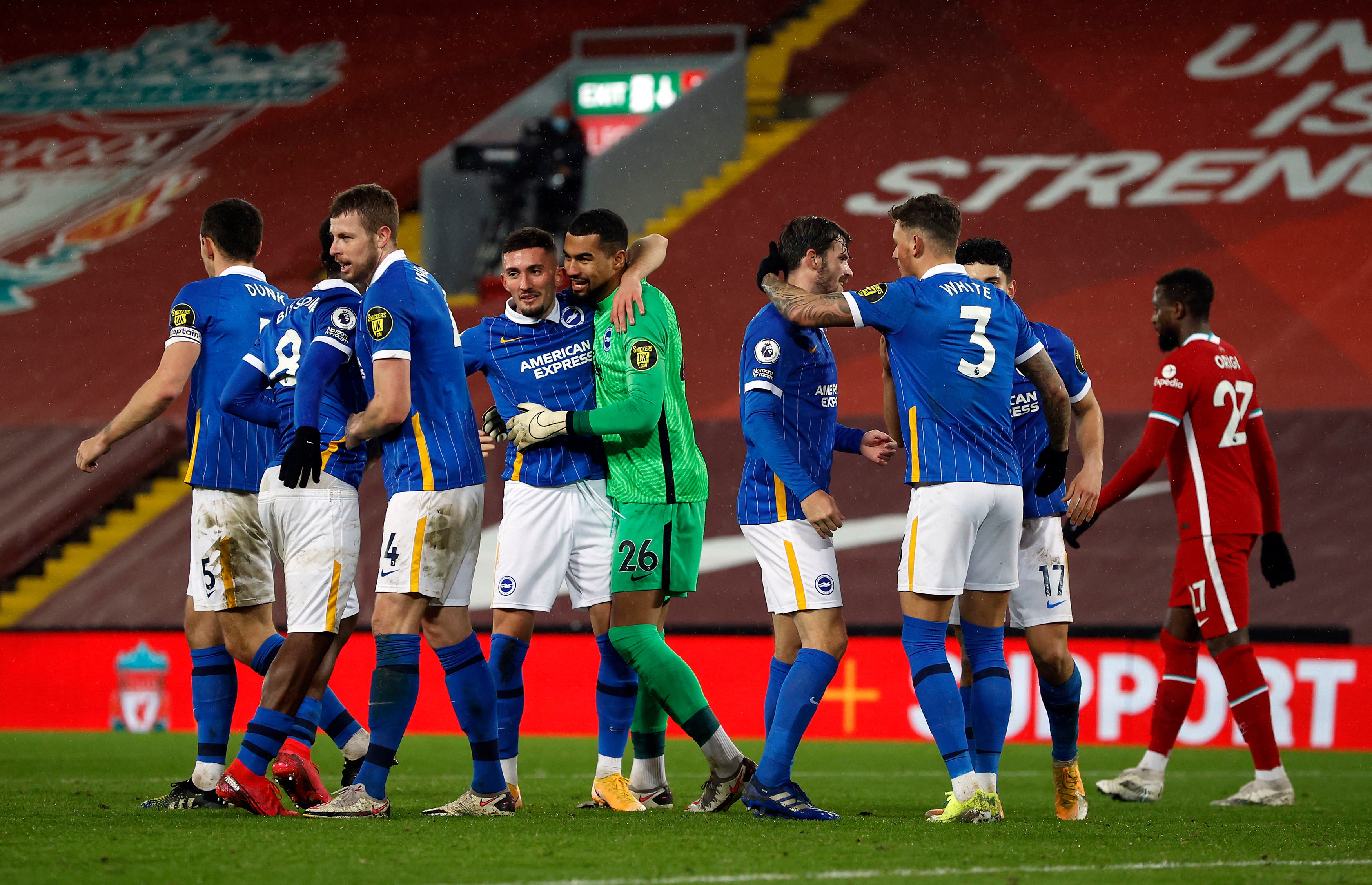 Brighton celebrate at the full-time whistle