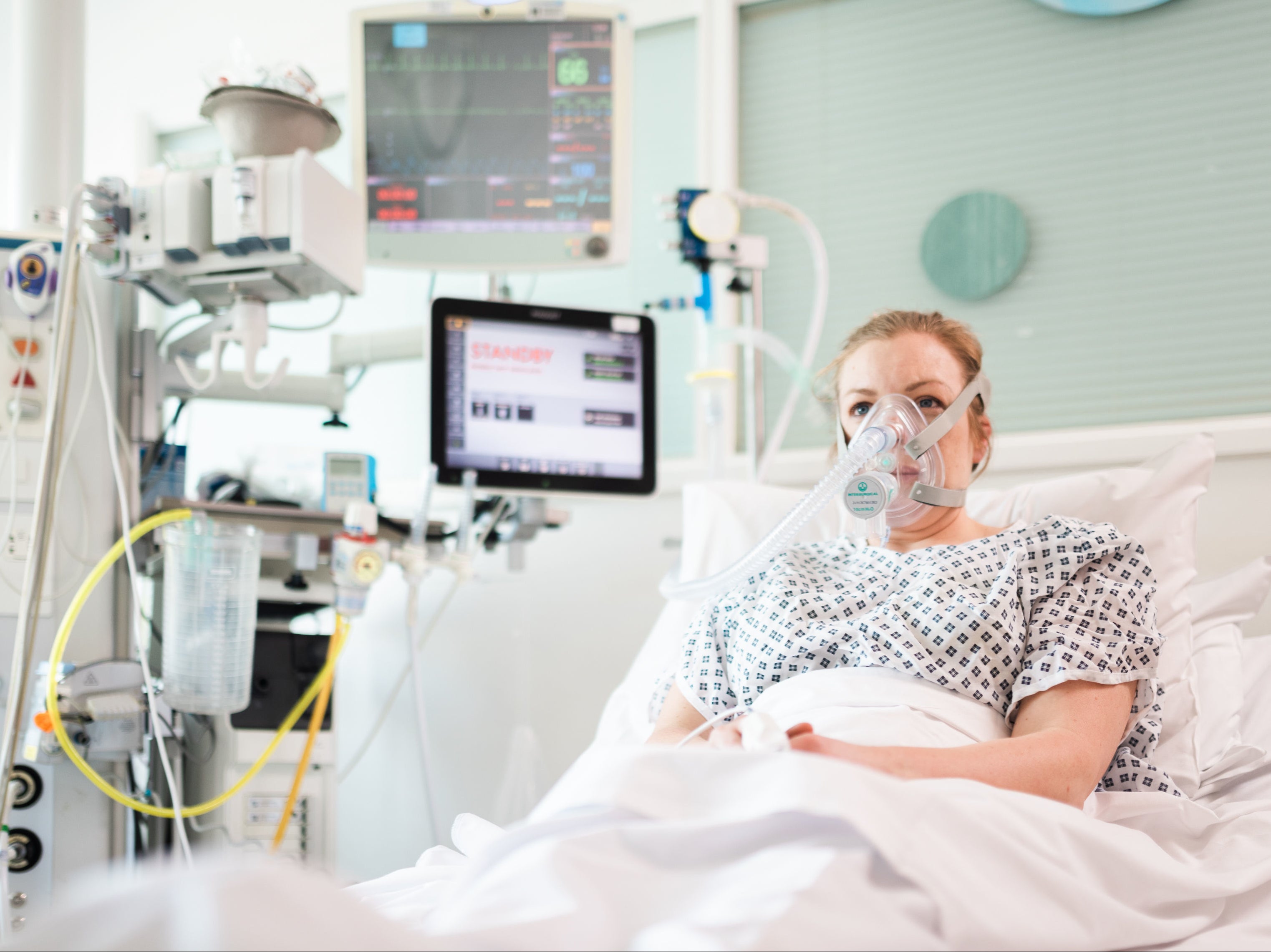 A volunteer patient demonstrating a continuous positive airway pressure (CPAP) breathing aid