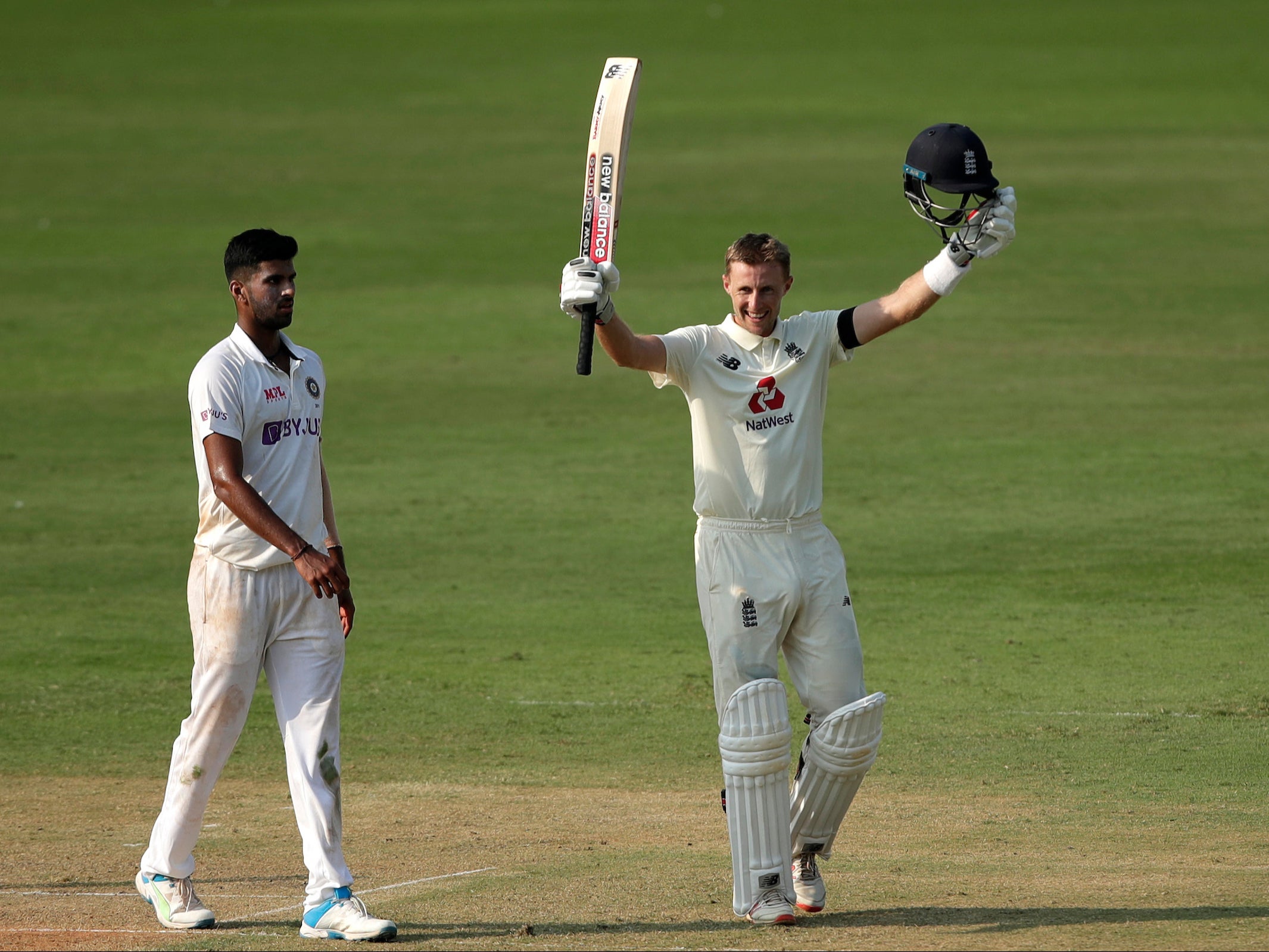 Joe Root celebrates scoring a hundred