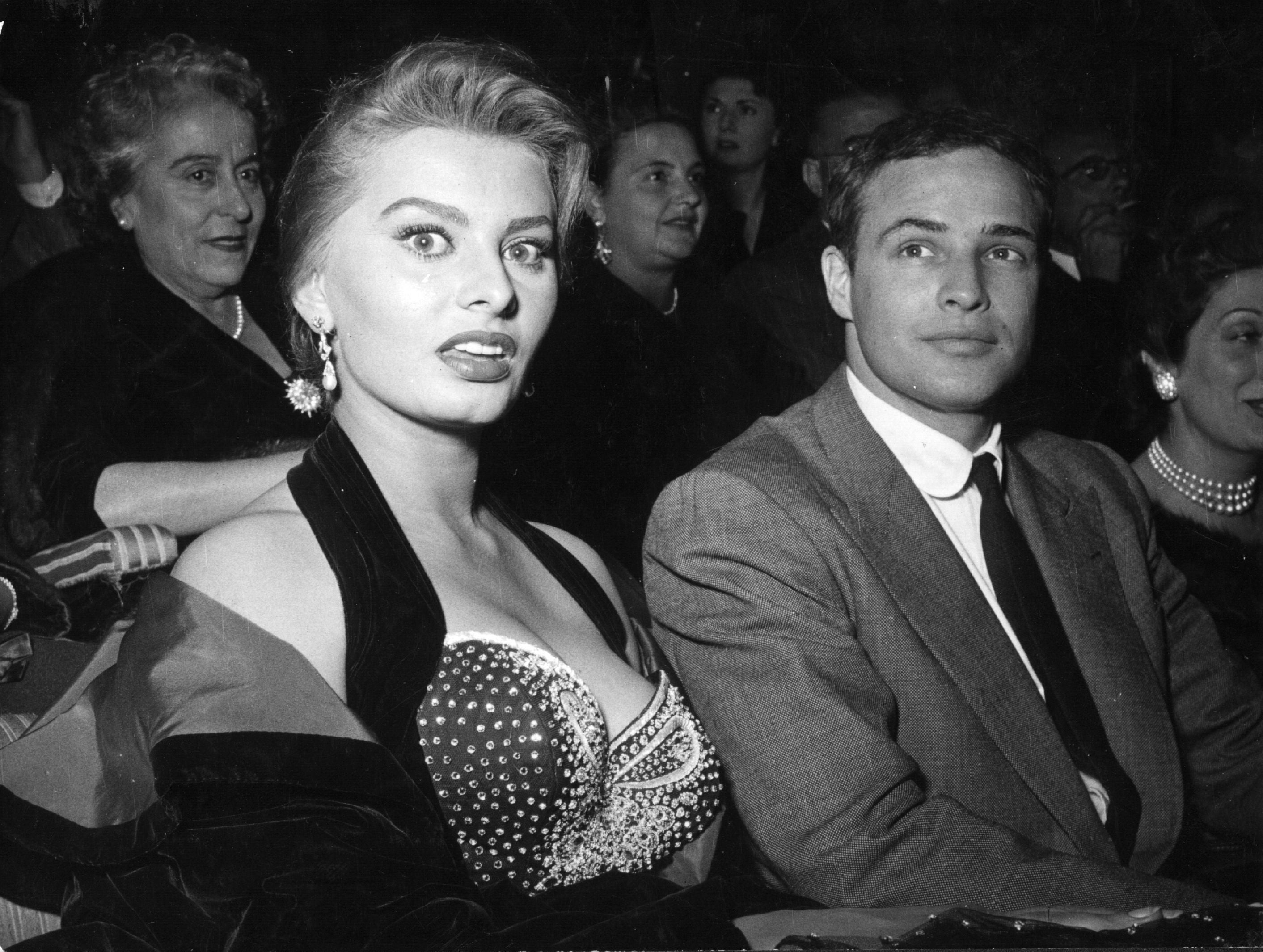 Loren and Marlon Brando at a cinema in Rome in 1954