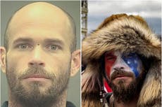 QAnon Shaman pictured without horns and face paint in mugshot, as he’s moved to jail with organic food