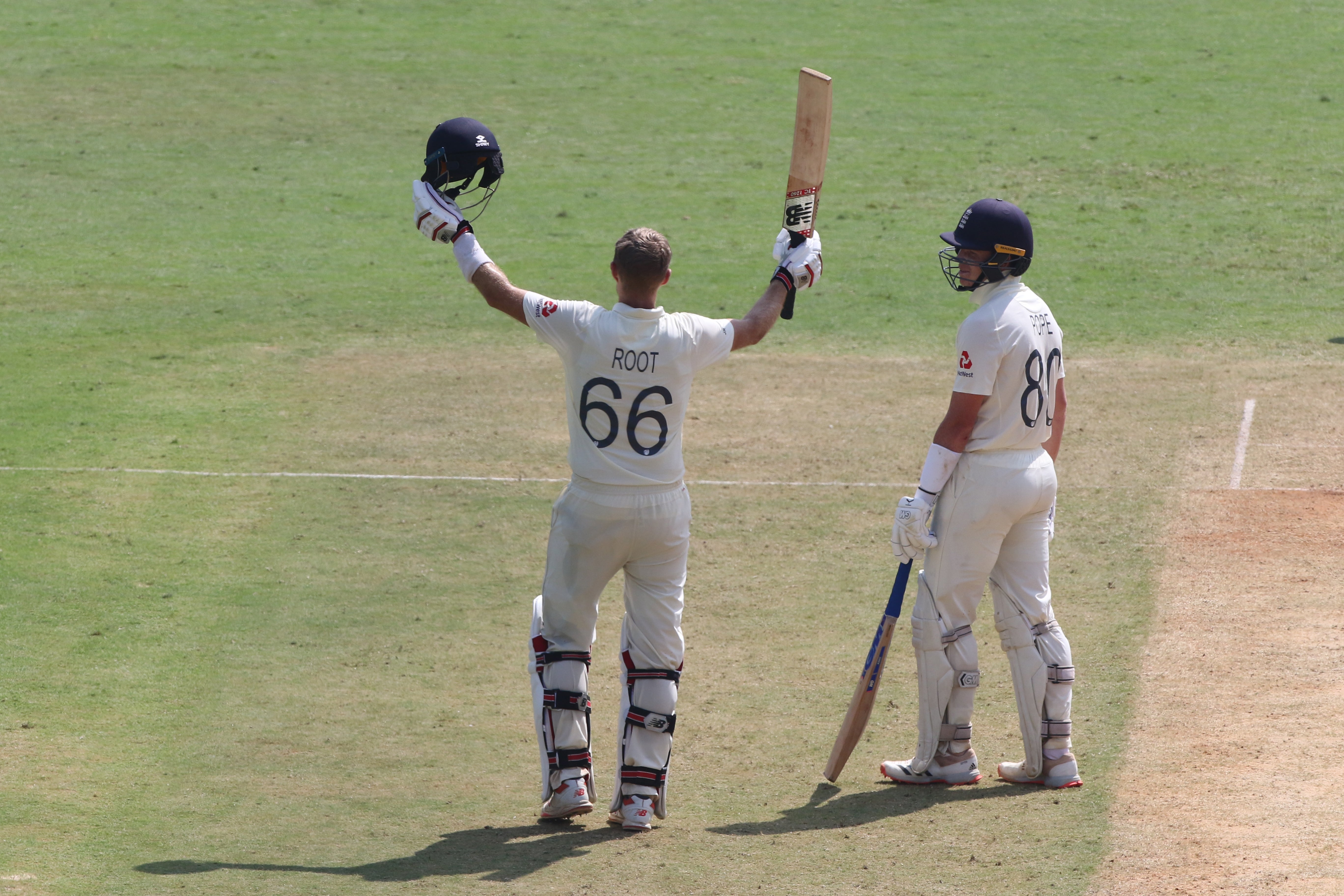 Joe Root celebrates in the direction of the England dressing room