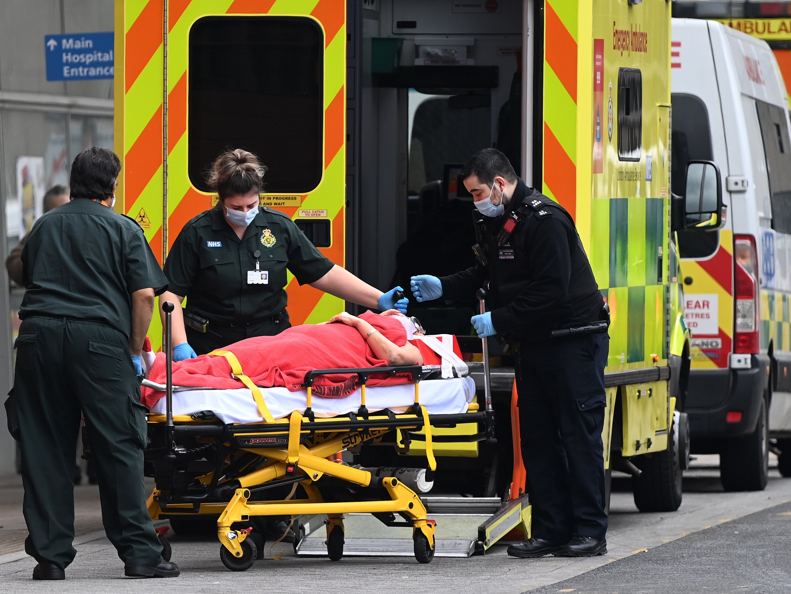 Ambulance staff bring a patient into the Royal London hospital