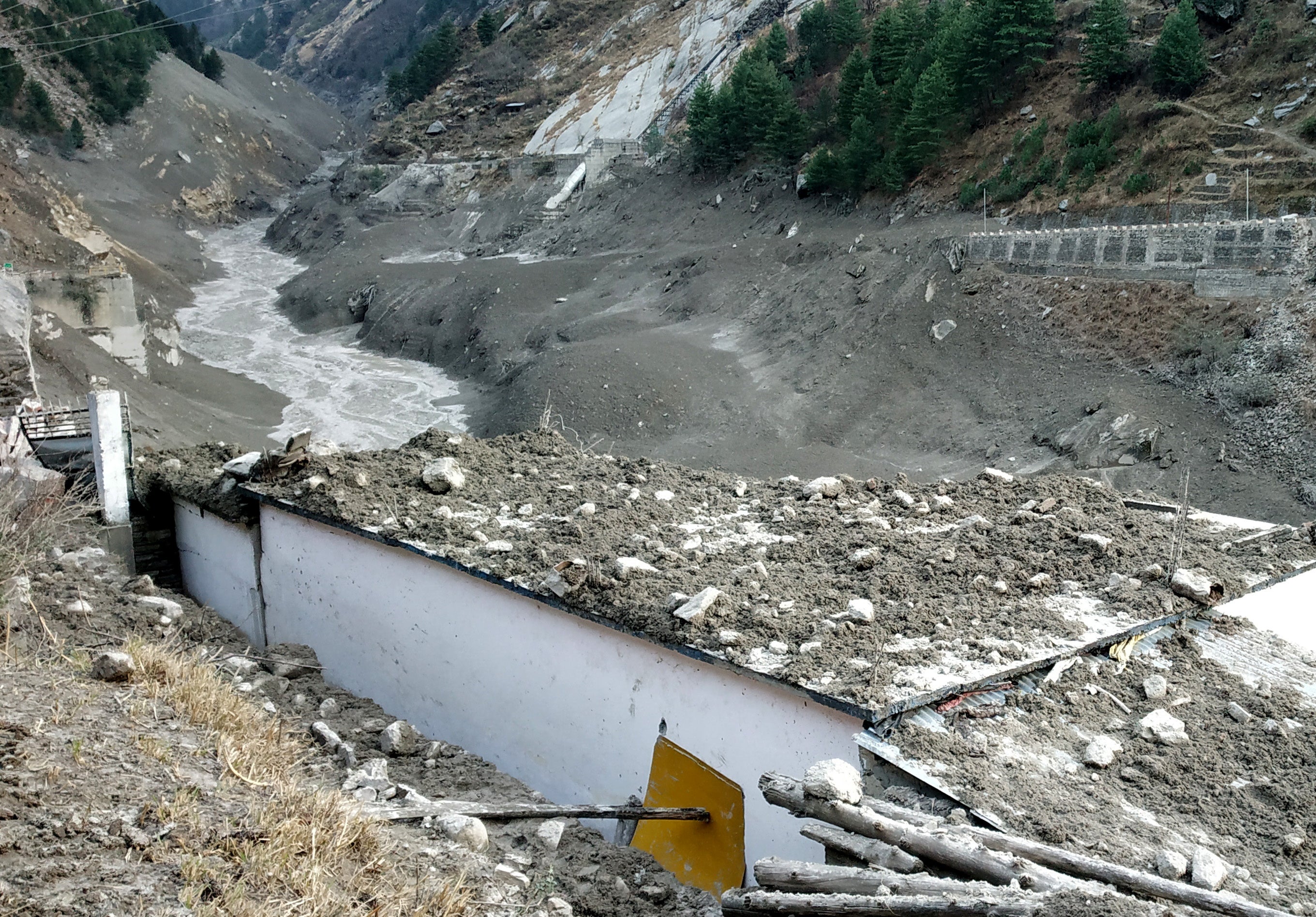 Damage after a Himalayan glacier broke and crashed into a dam at Raini Chak Lata village in Chamoli district, in the northern state of Uttarakhand on 7 February