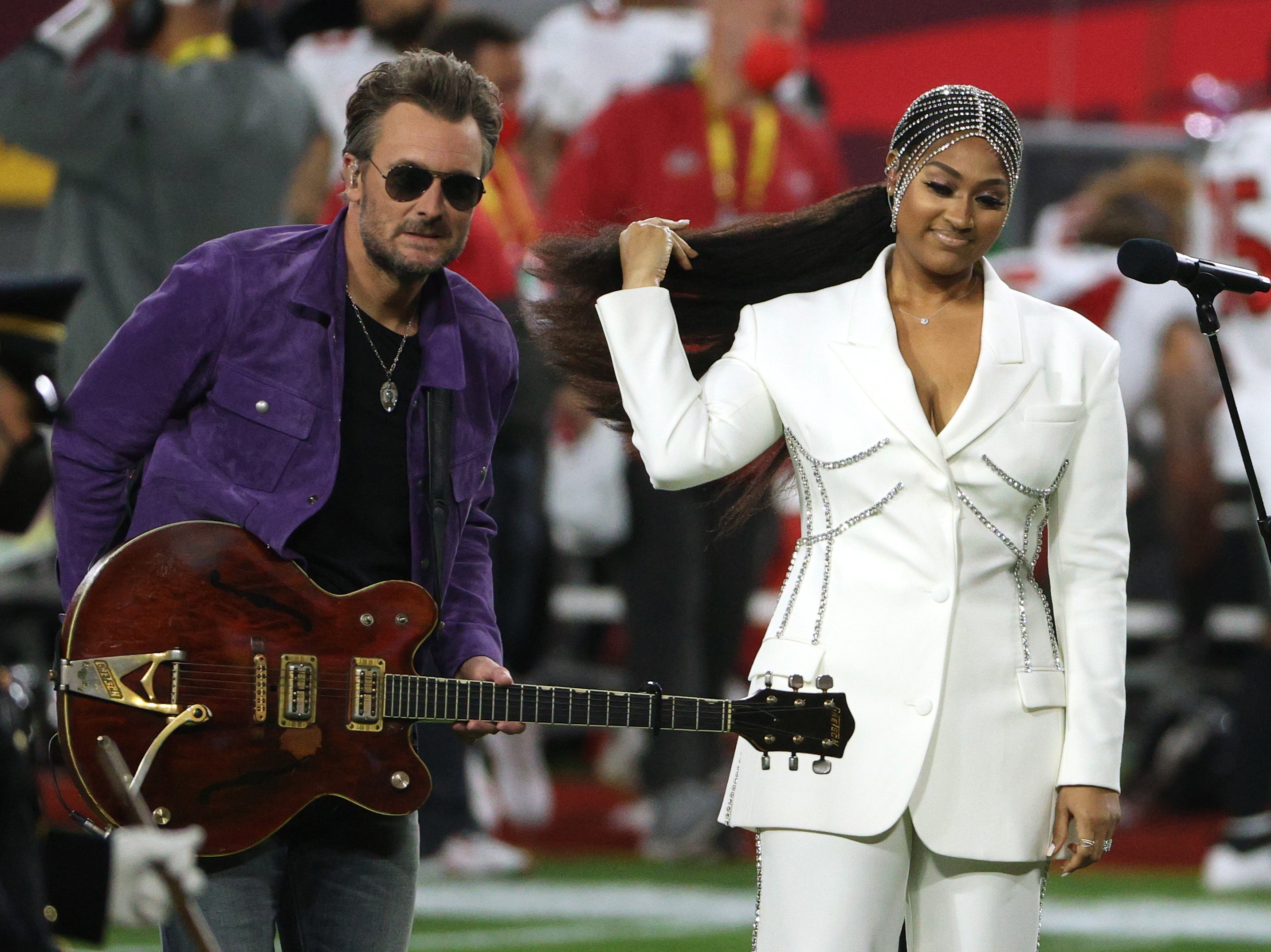 Jazmine Sullivan and Eric Church perform the national anthem before Super Bowl LV on 7 February 2021 in Tampa, Florida