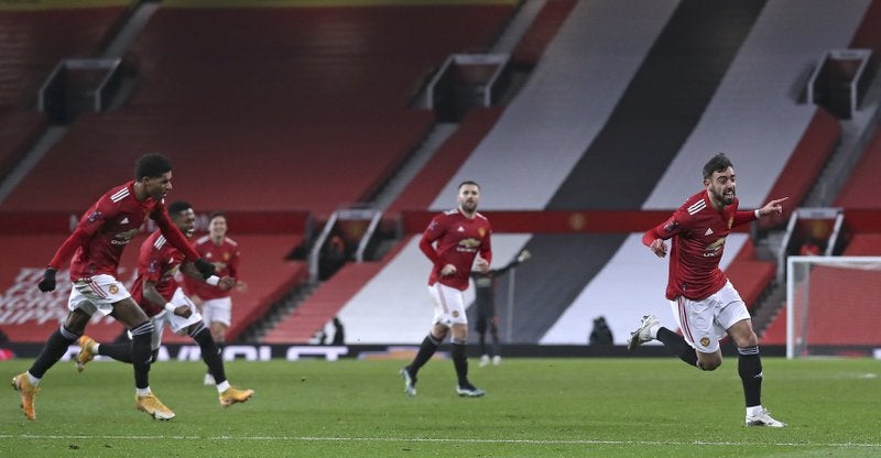 Manchester United celebrate scoring at Old Trafford