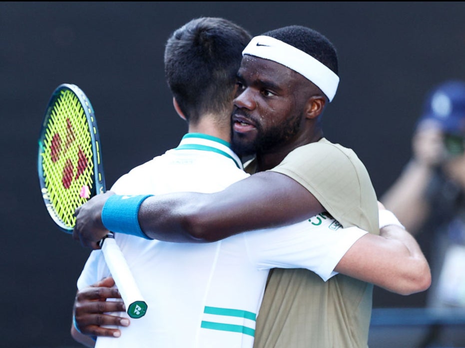 Novak Djokovic and Frances Tiafoe embrace after their match