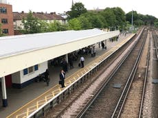 Railway worker dies after being hit by train in London