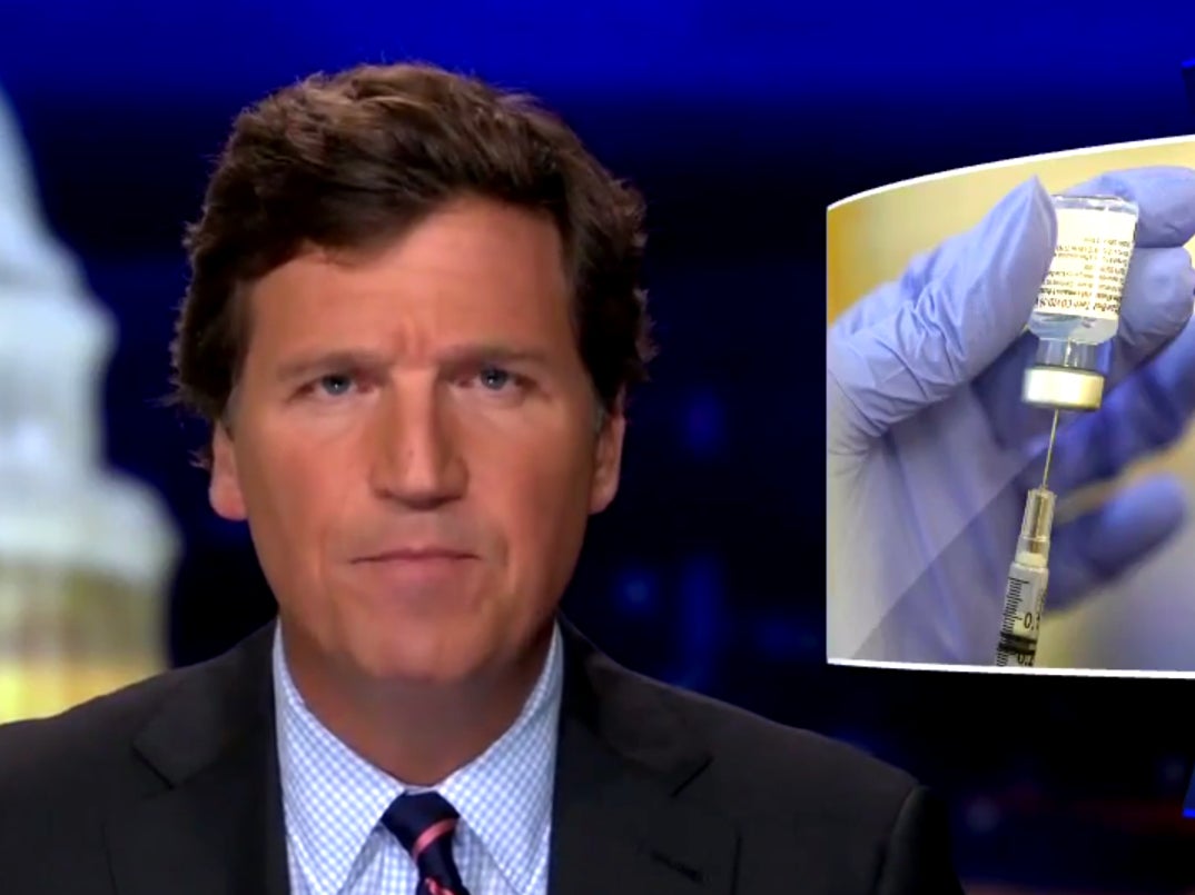 Tucker Carlson says US authorities ‘lying’ about Covid vaccines as conservative media sows doubts over safety