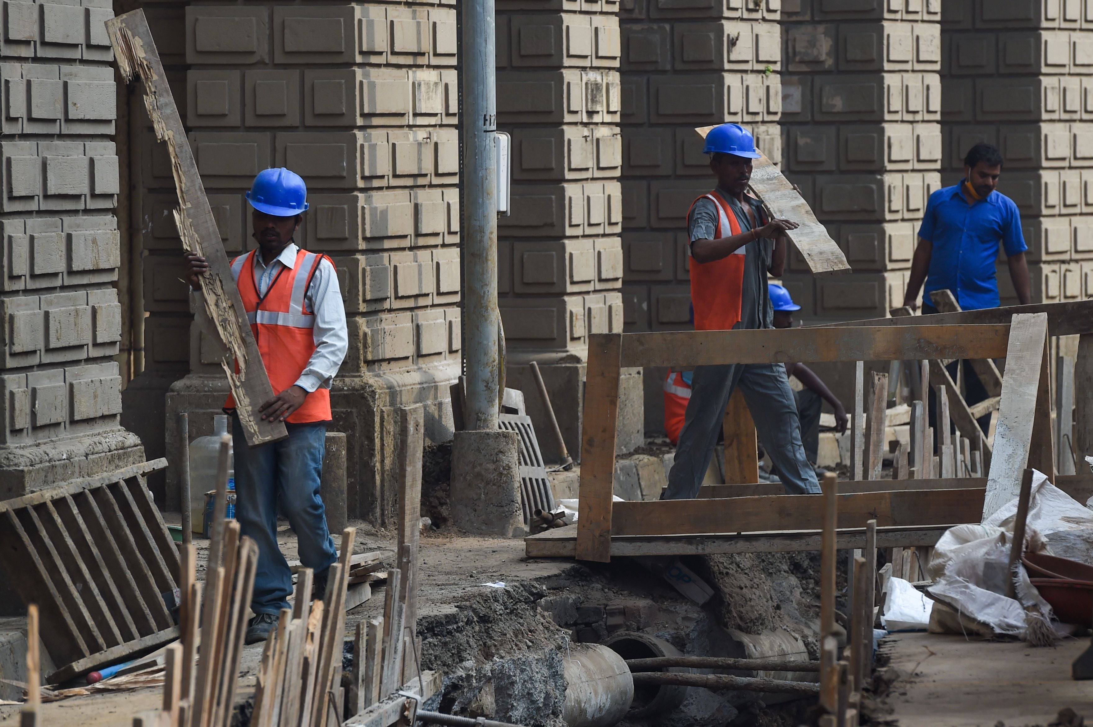 File image: Migrant labourers work at a construction site for laying new electricity cables in Mumbai on January 7, 2021.